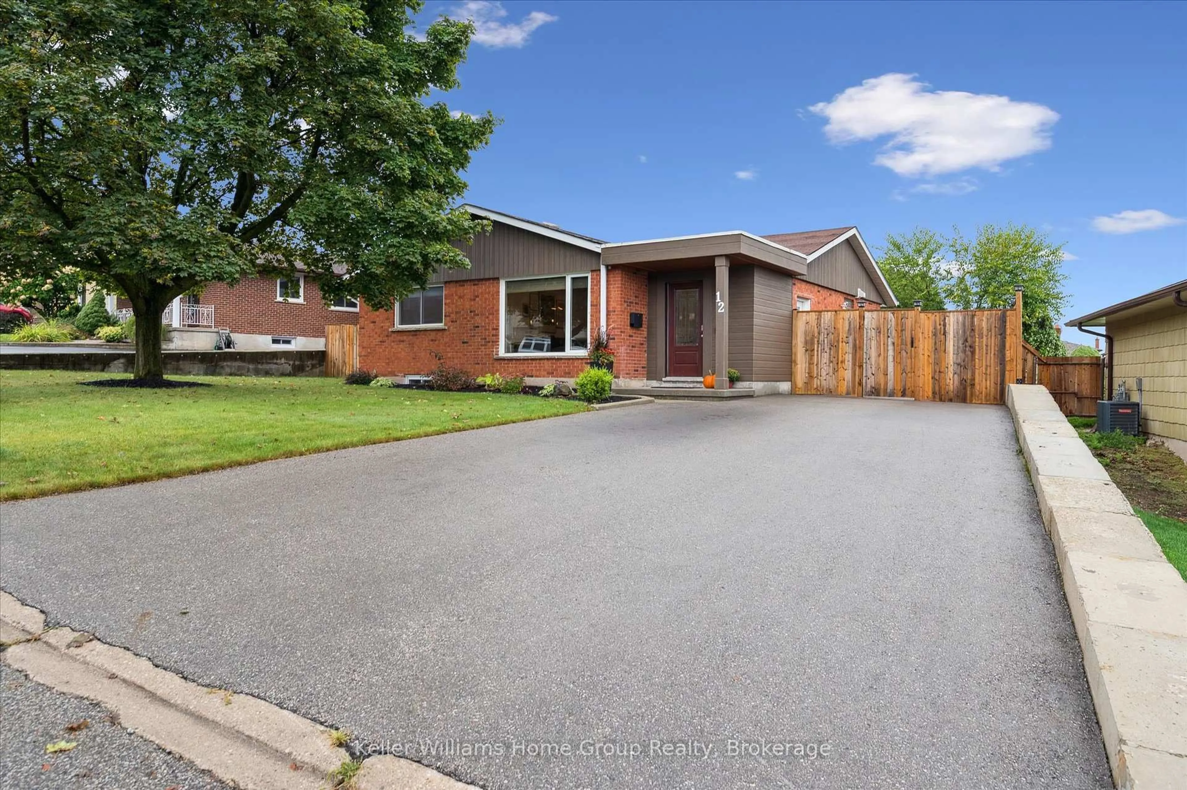 Home with brick exterior material, street for 12 Greenbrier Rd, Cambridge Ontario N1R 6M9