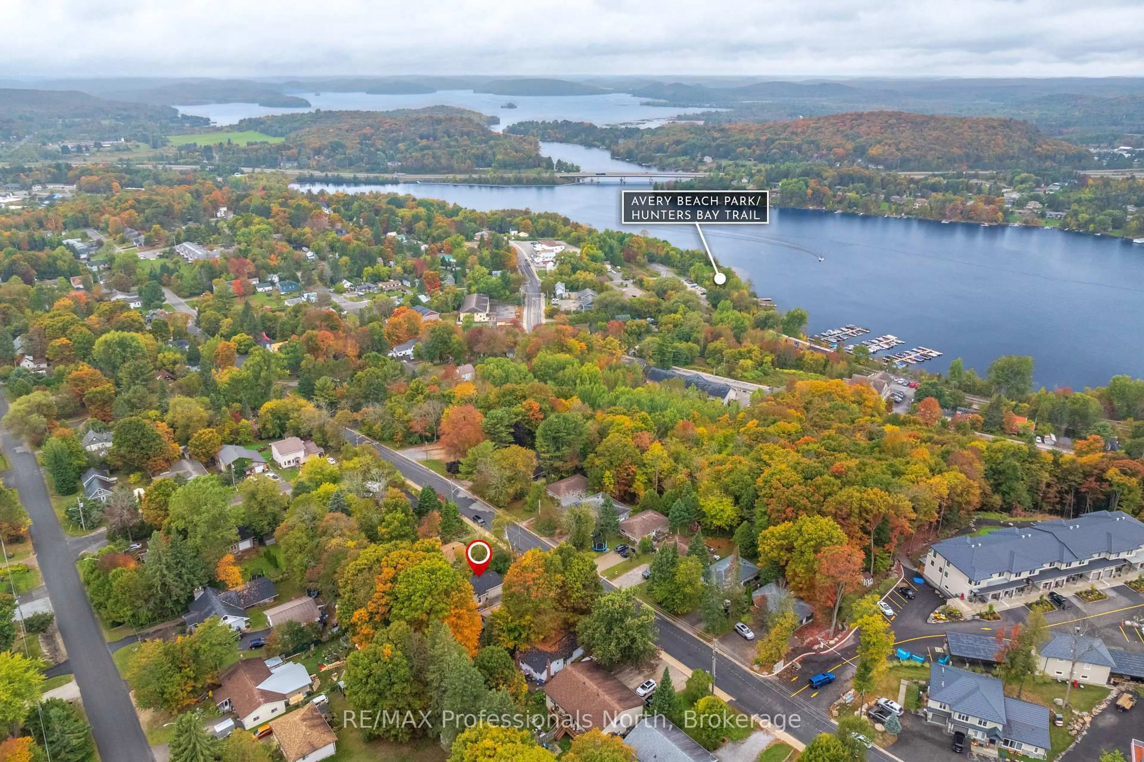 A pic from outside/outdoor area/front of a property/back of a property/a pic from drone, water/lake/river/ocean view for 83 Florence St, Huntsville Ontario P1H 1V5