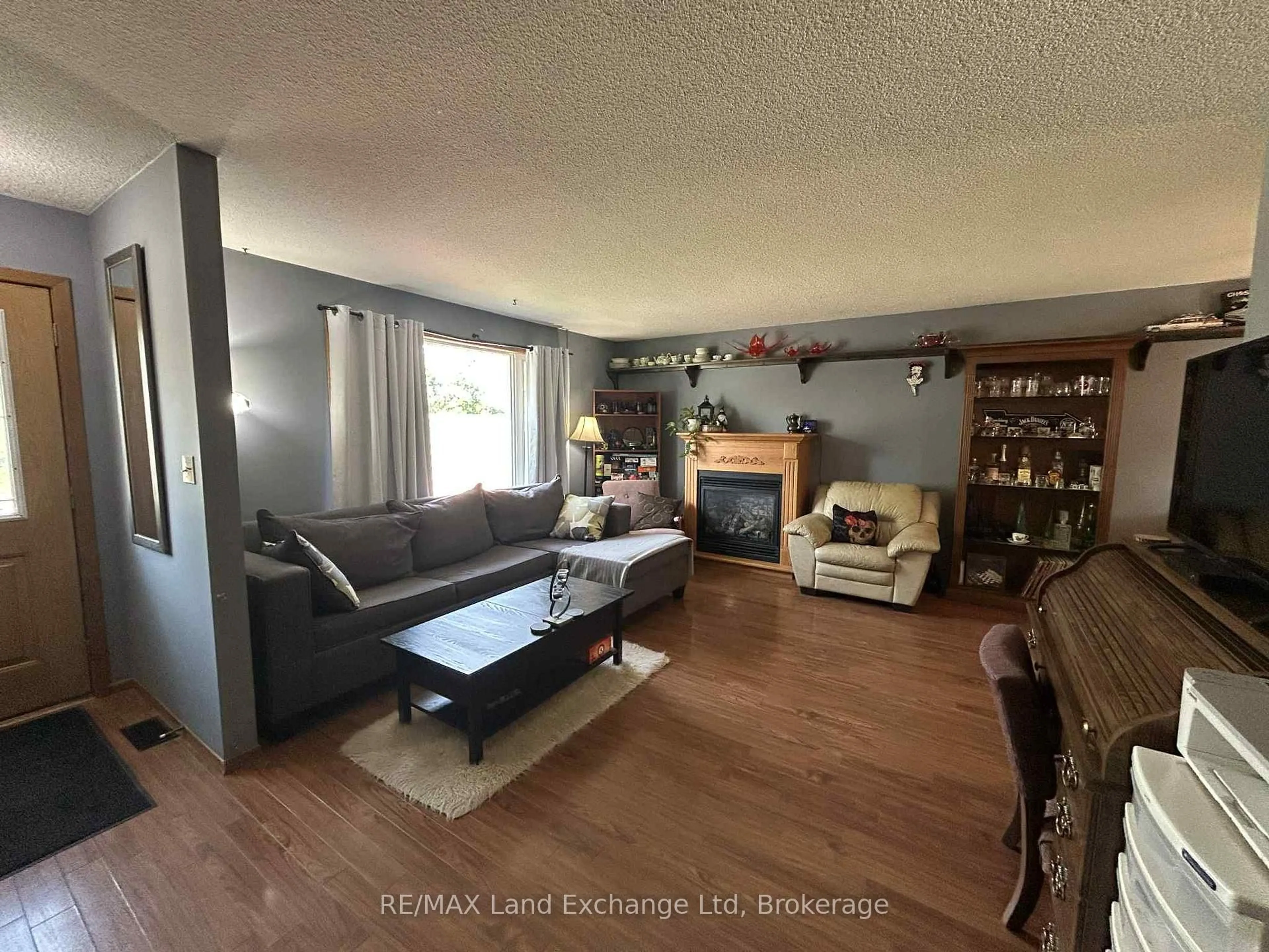 Living room with furniture, unknown for 39724 Amberley Rd #30, Morris Turnberry Ontario N0G 2W0