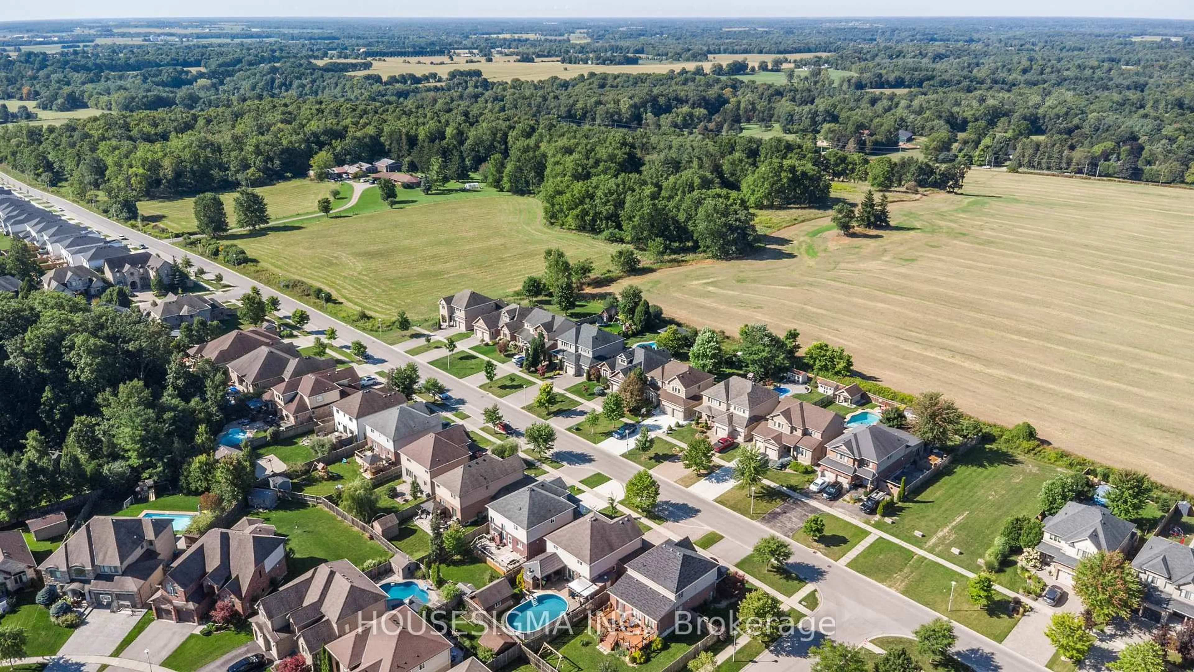 A pic from outside/outdoor area/front of a property/back of a property/a pic from drone, street for 2203 Wickerson Rd, London South Ontario N6K 0C3