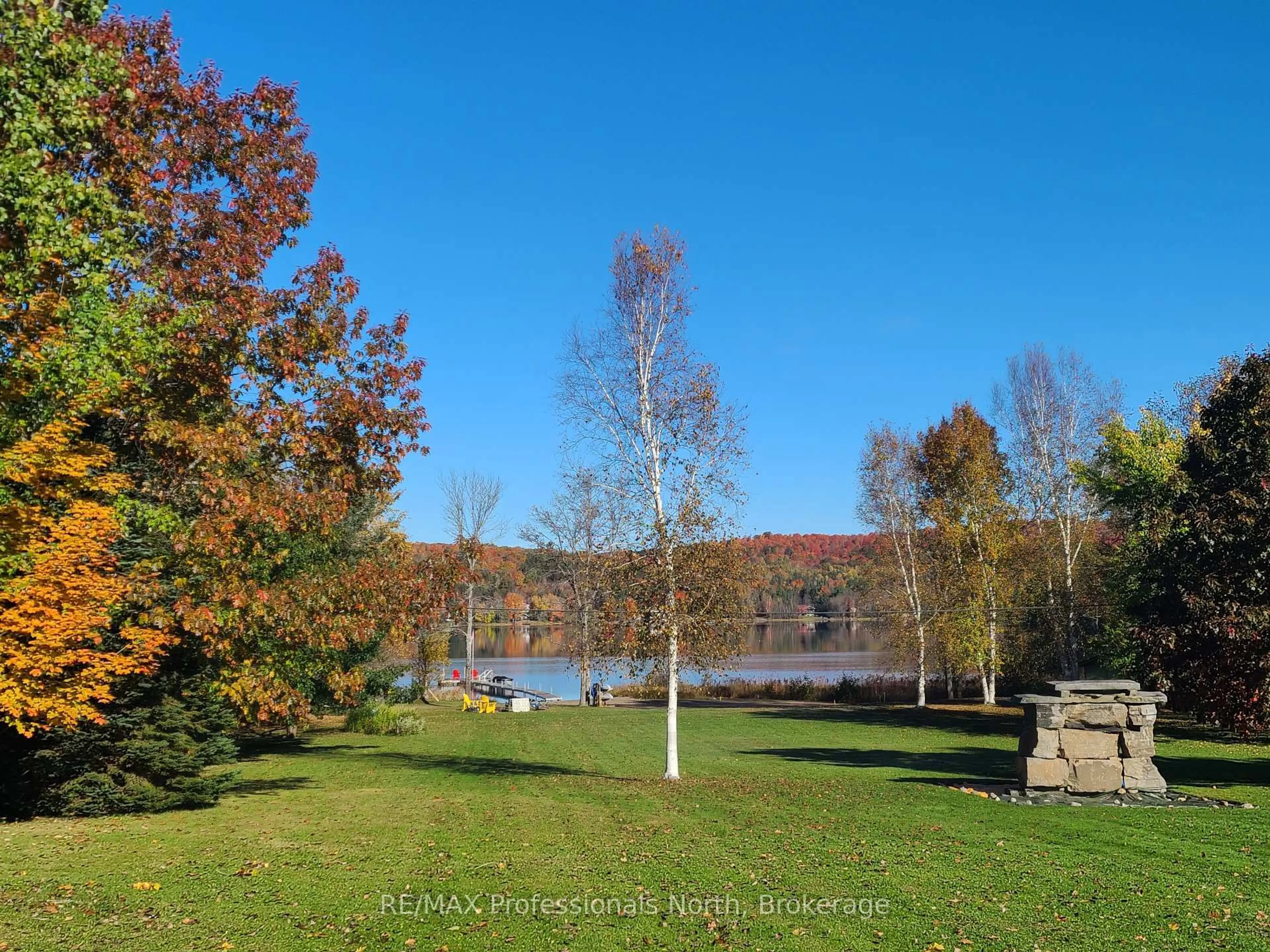 A pic from outside/outdoor area/front of a property/back of a property/a pic from drone, water/lake/river/ocean view for 1331 Eagle Lake Rd, Dysart et al Ontario K0M 1S0