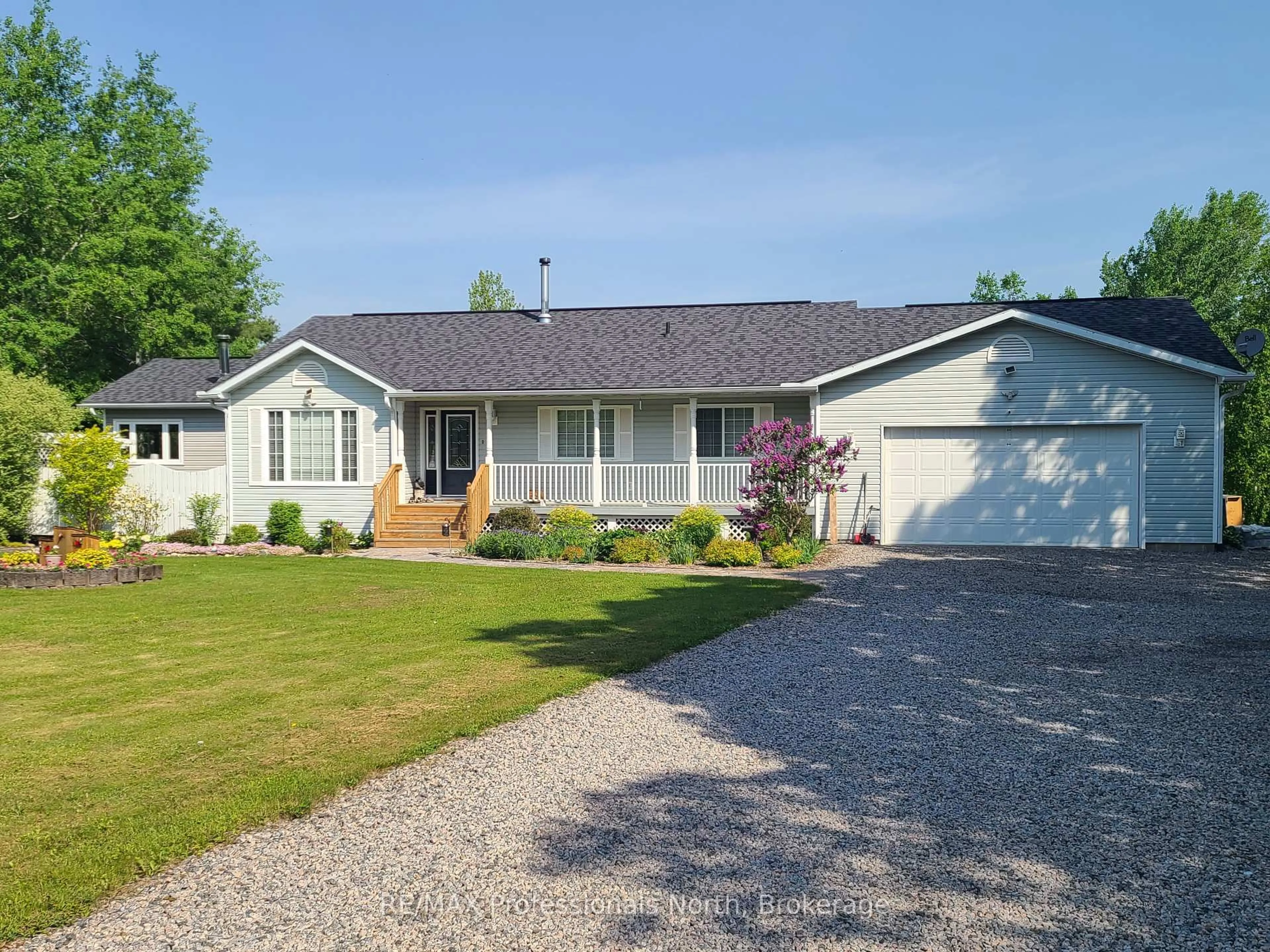 Home with vinyl exterior material, street for 1331 Eagle Lake Rd, Dysart et al Ontario K0M 1S0