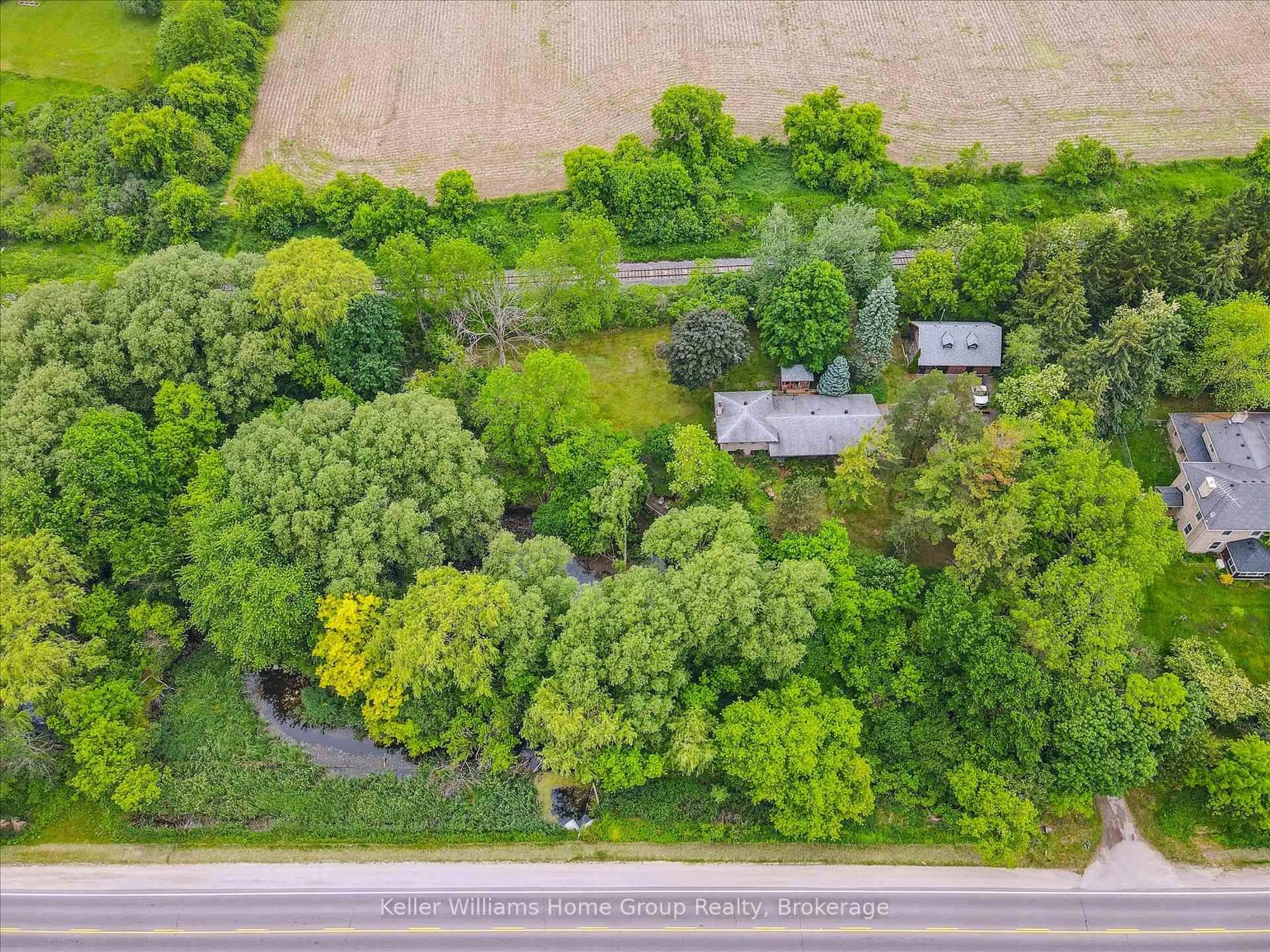 A pic from outside/outdoor area/front of a property/back of a property/a pic from drone, forest/trees view for 7850 7 Highway, Guelph/Eramosa Ontario N1H 6H8