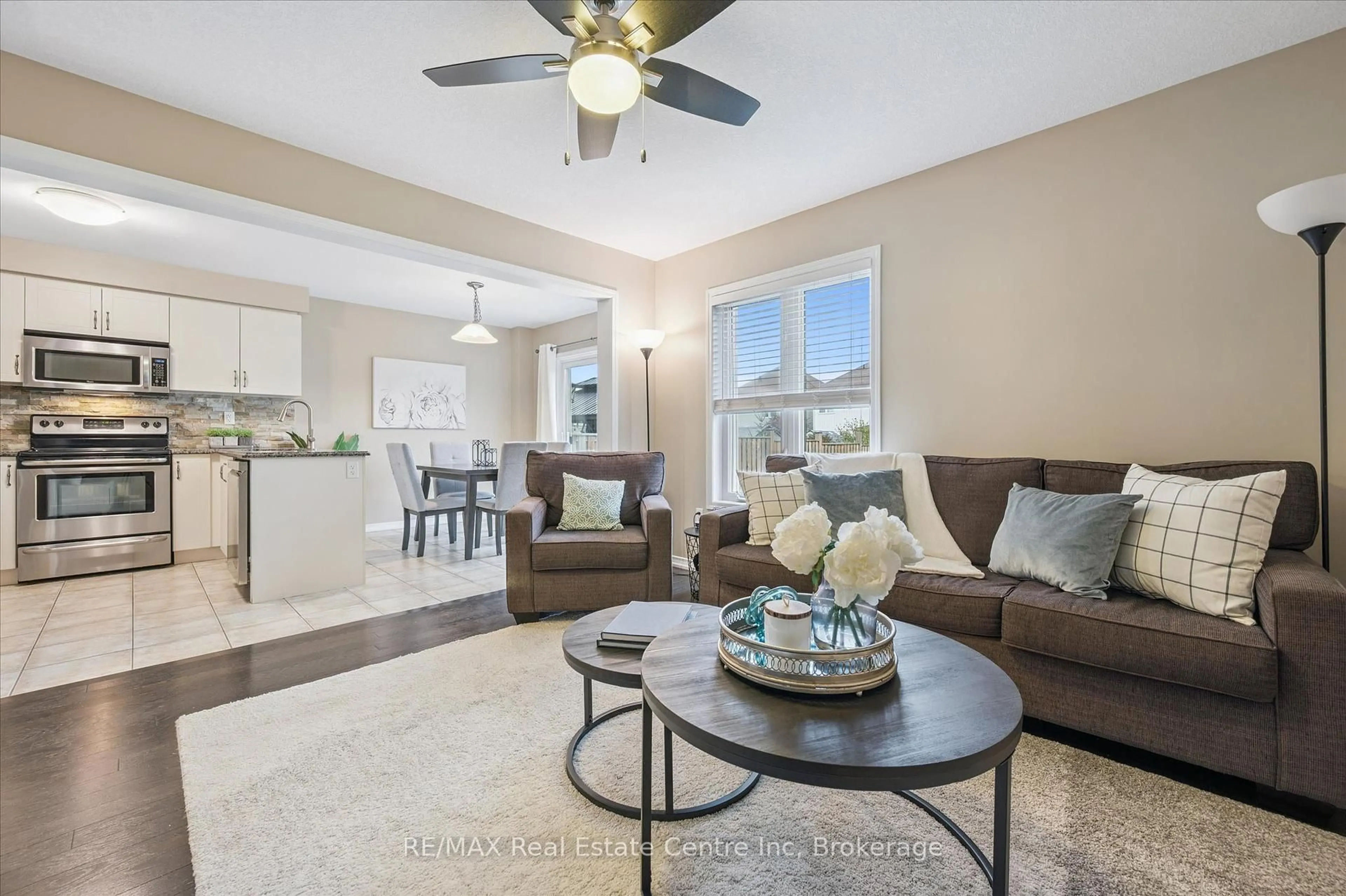 Living room with furniture, ceramic/tile floor for 90 Starlight Ave, Woolwich Ontario N0B 1M0