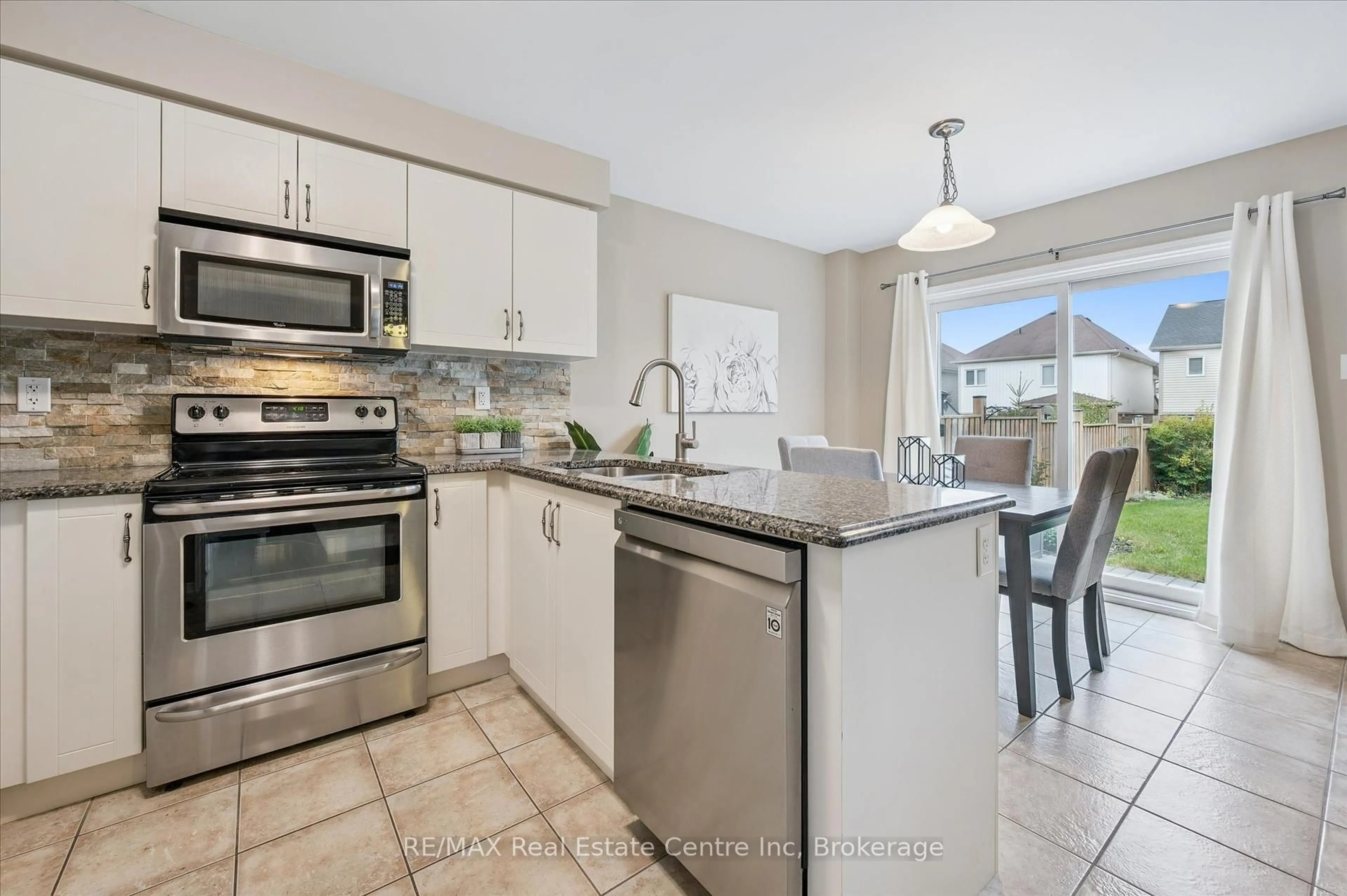 Open concept kitchen, ceramic/tile floor for 90 Starlight Ave, Woolwich Ontario N0B 1M0