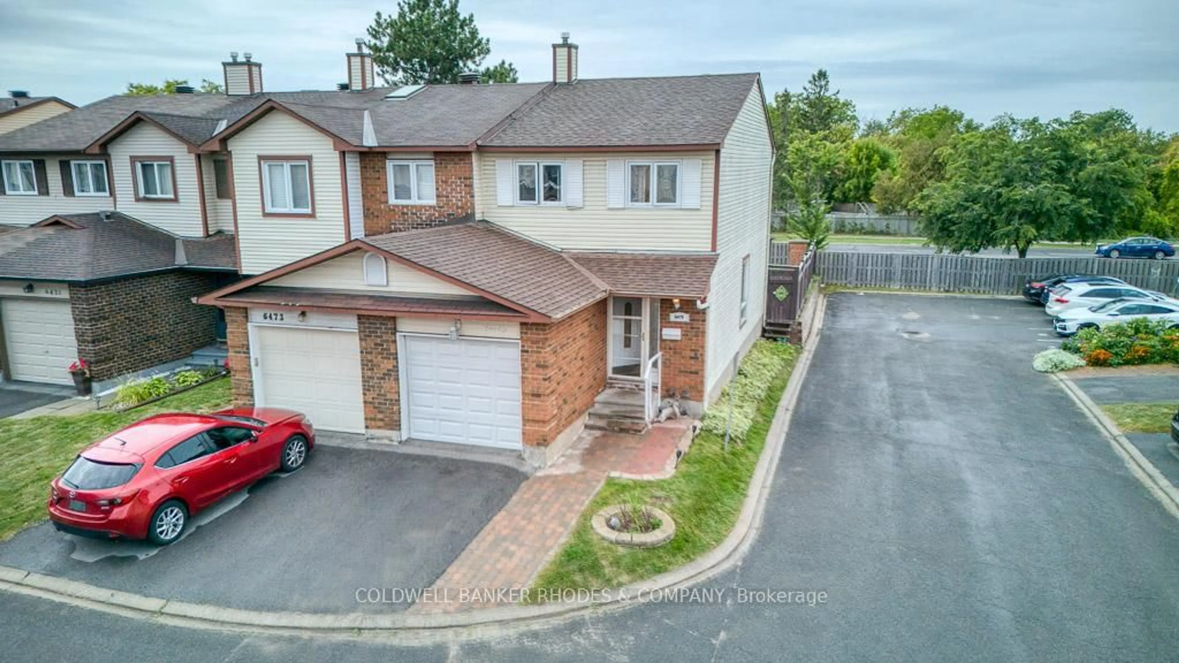 A pic from outside/outdoor area/front of a property/back of a property/a pic from drone, street for 6475 Colony Sq #18, Orleans Ontario K1C 3E1
