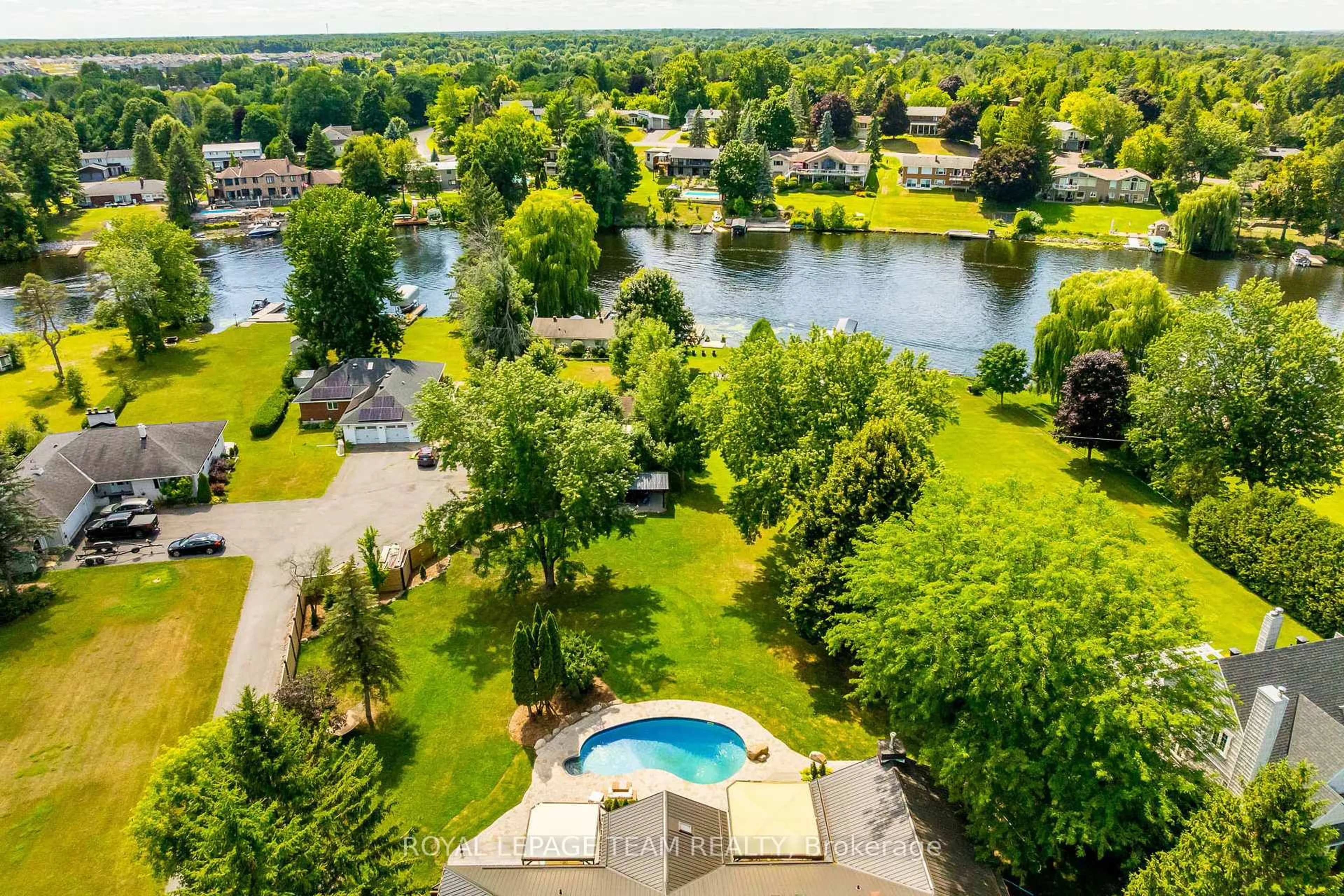 A pic from outside/outdoor area/front of a property/back of a property/a pic from drone, water/lake/river/ocean view for 1216A River Rd, Ottawa Ontario K4M 1B4
