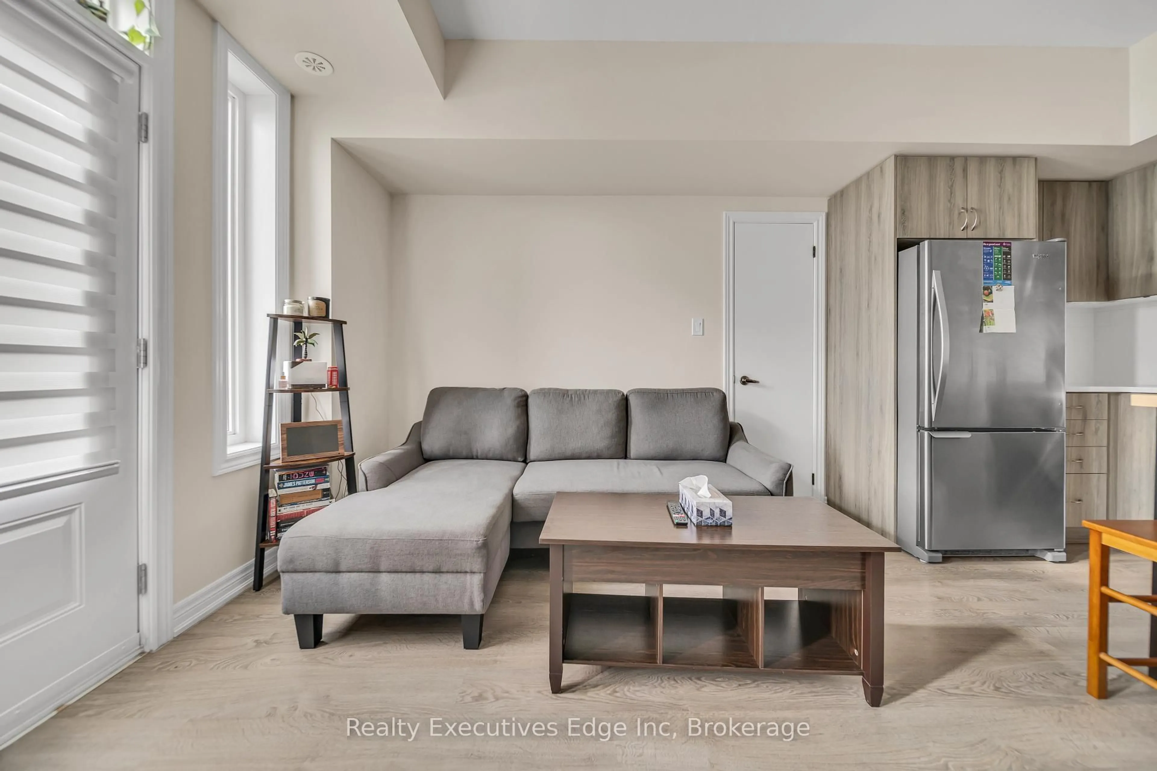 Living room with furniture, unknown for 252 Law Dr #65, Guelph Ontario N1E 0P6