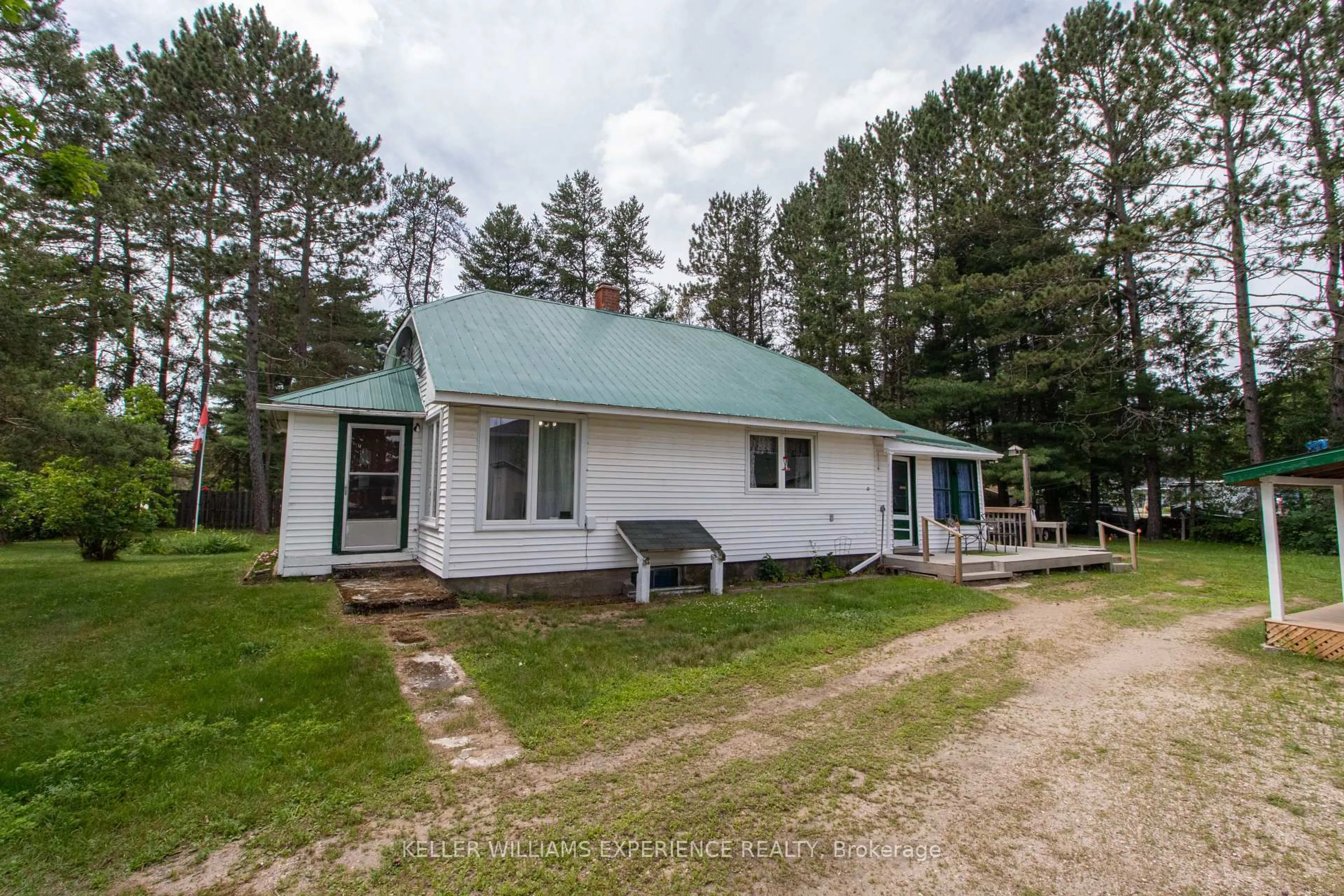 A pic from outside/outdoor area/front of a property/back of a property/a pic from drone, unknown for 152 Ottawa Ave, South River Ontario P0A 1X0
