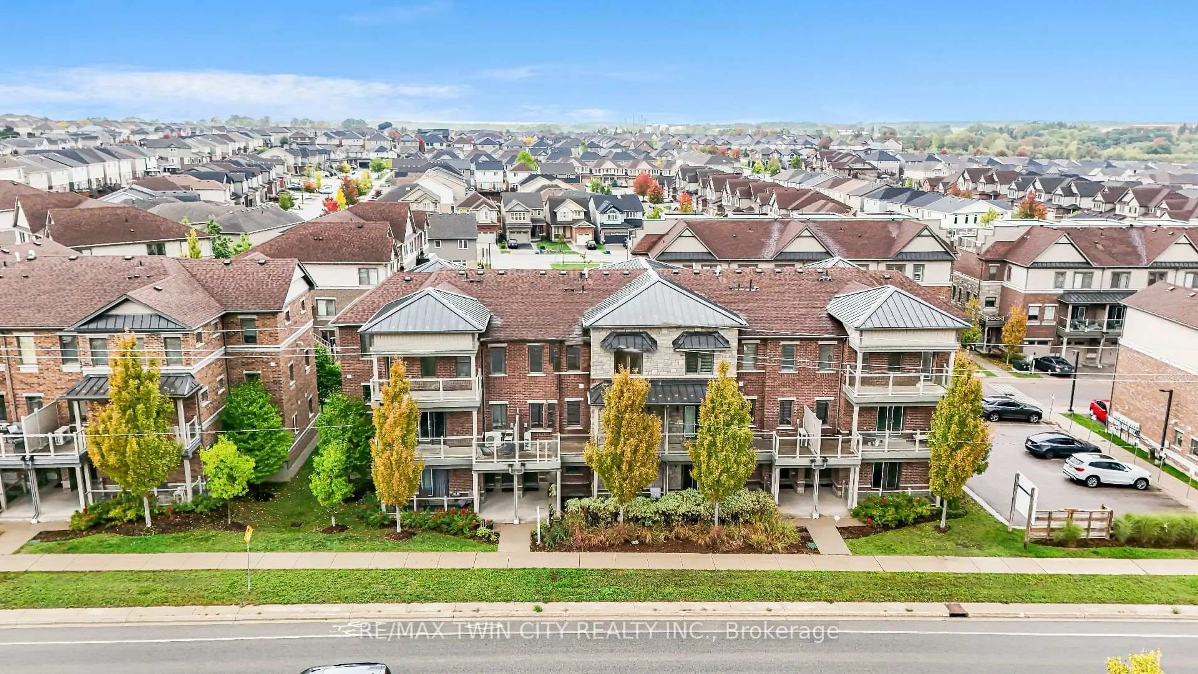A pic from outside/outdoor area/front of a property/back of a property/a pic from drone, city buildings view from balcony for 1108 Fairway Rd #C, Kitchener Ontario N2A 0J3
