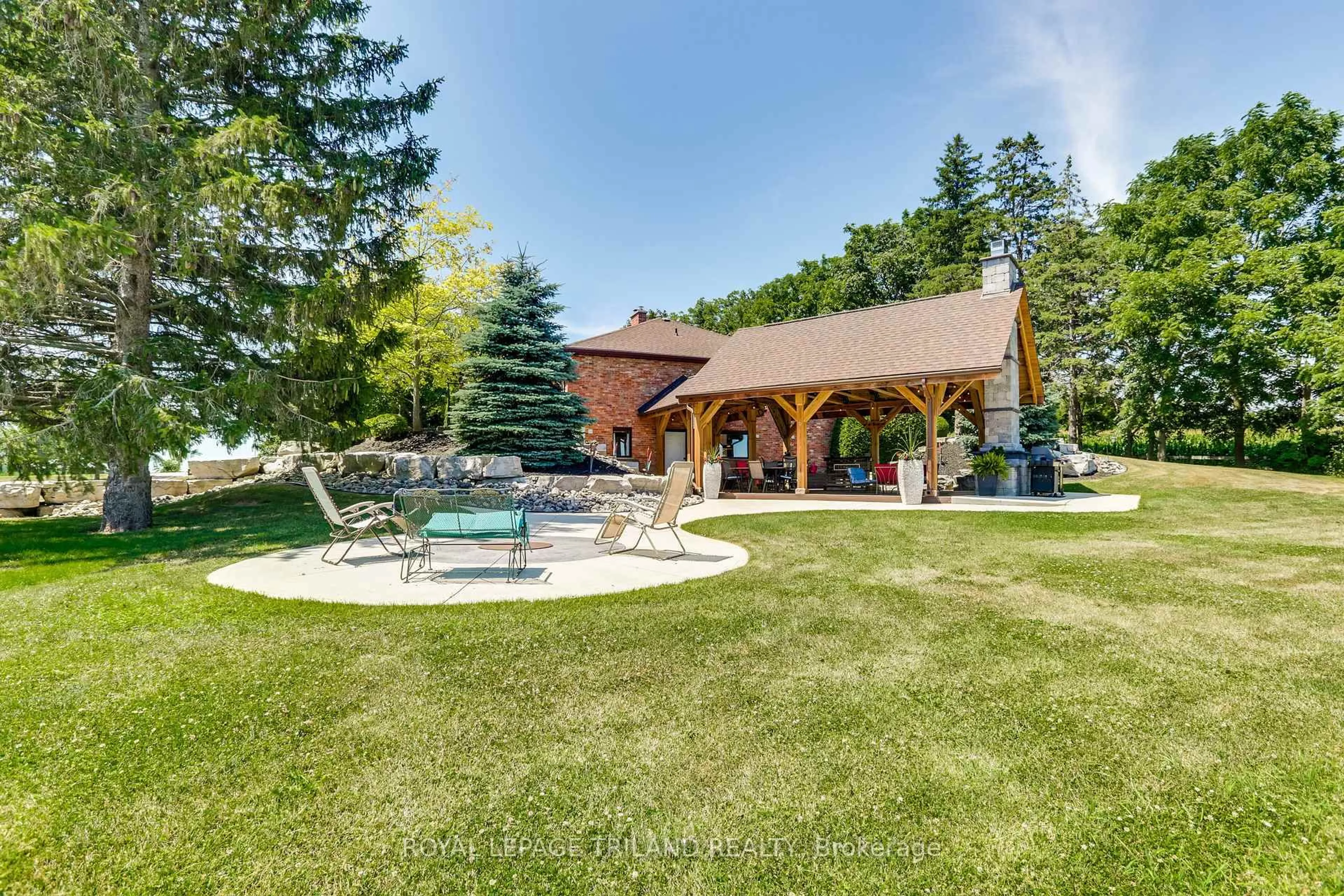 A pic from outside/outdoor area/front of a property/back of a property/a pic from drone, water/lake/river/ocean view for 22604 Vanneck Rd, Middlesex Centre Ontario N0M 2A0