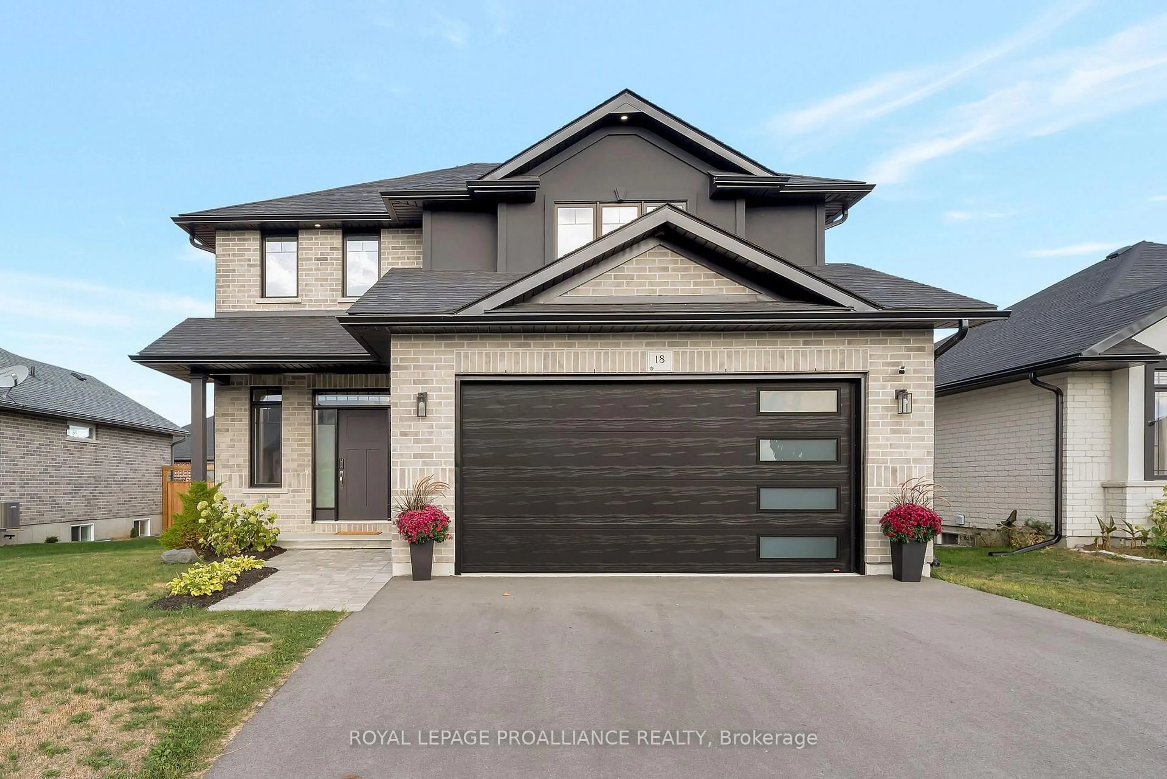 Home with brick exterior material, street for 18 RAYCROFT Dr, Belleville Ontario K8N 0R4