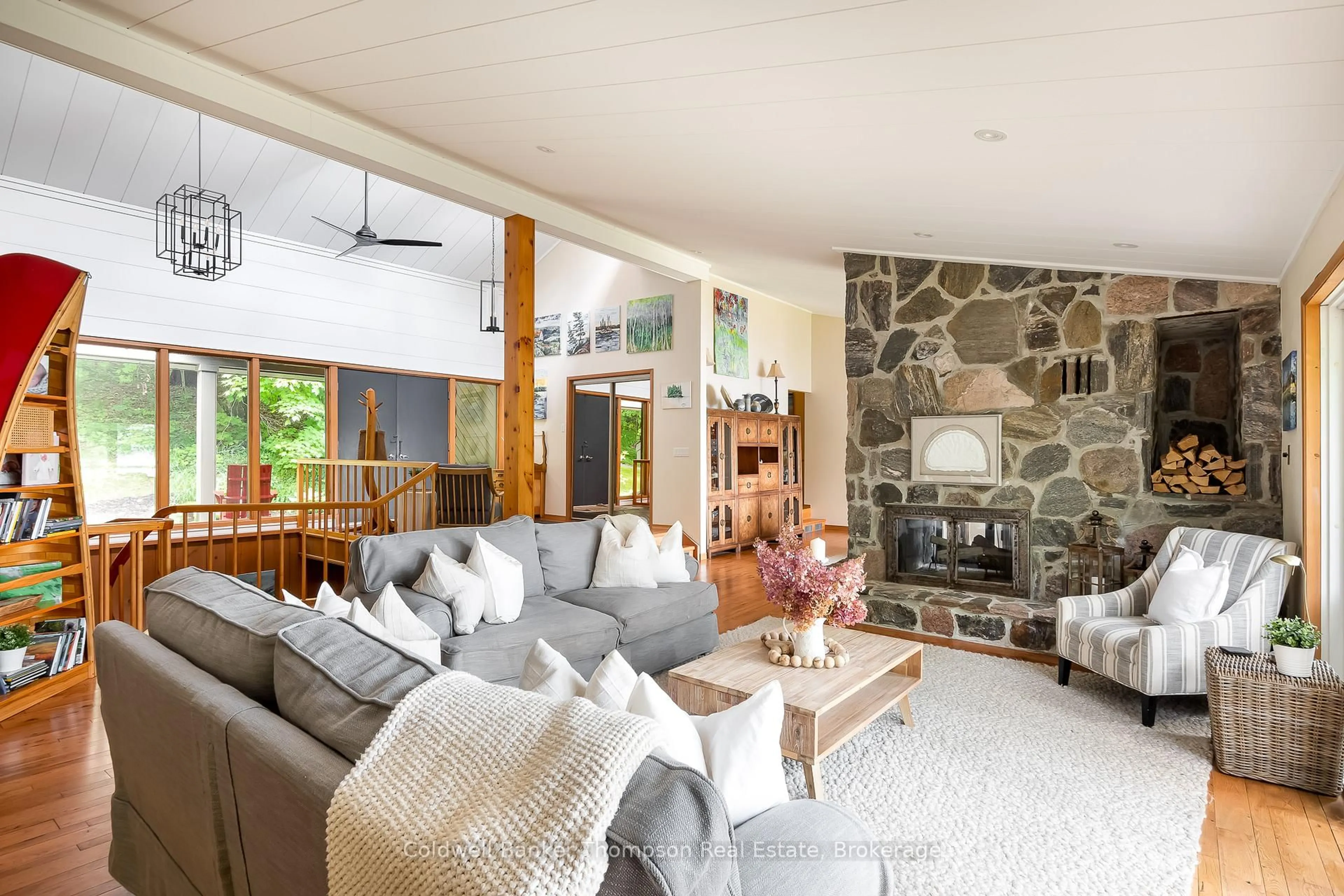 Living room with furniture, cement floor for 54 Rowan Dr, Huntsville Ontario P1H 2J2