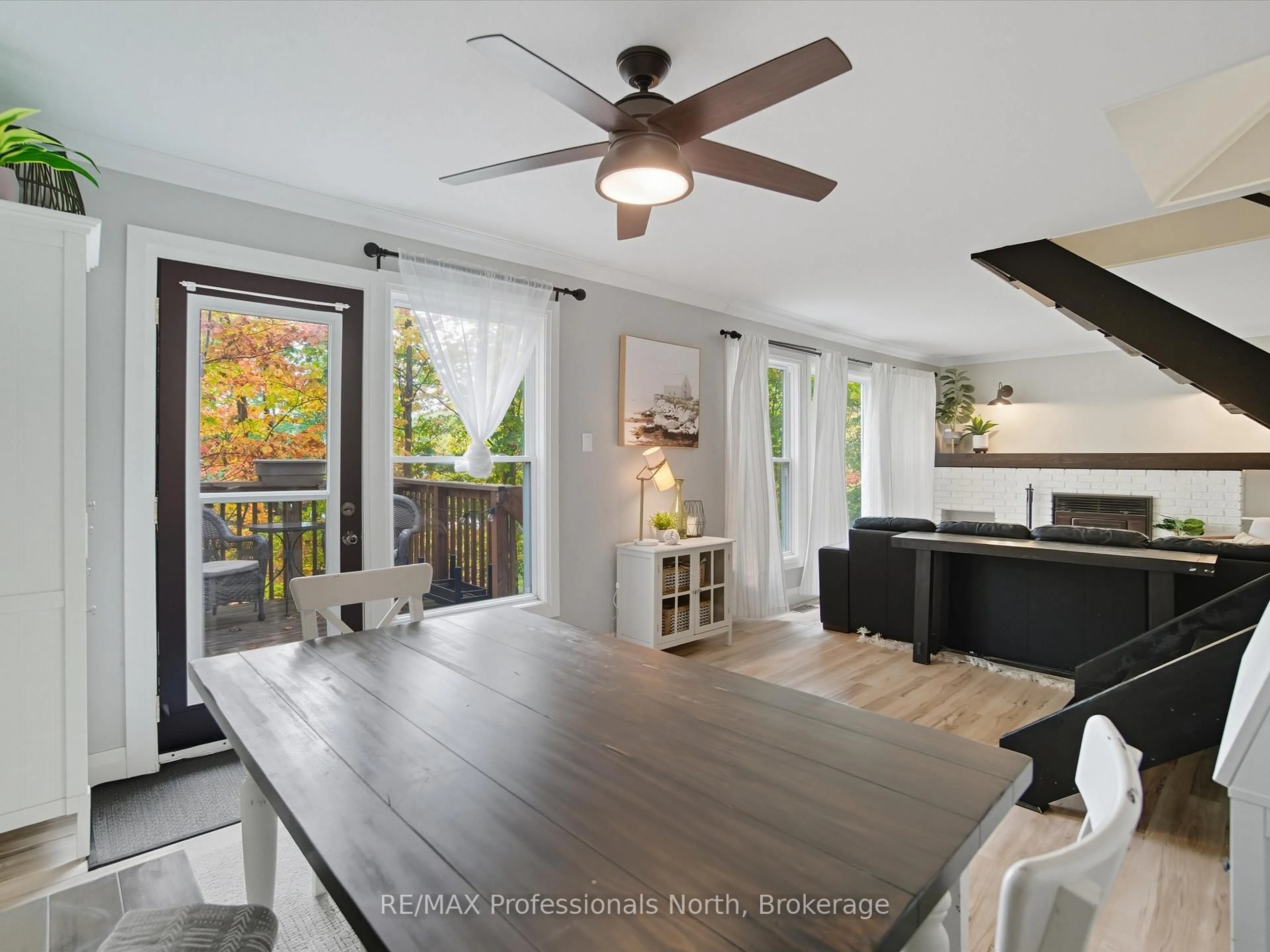Open concept kitchen, wood/laminate floor for 1755 Skyline Dr, Huntsville Ontario P1H 1A7