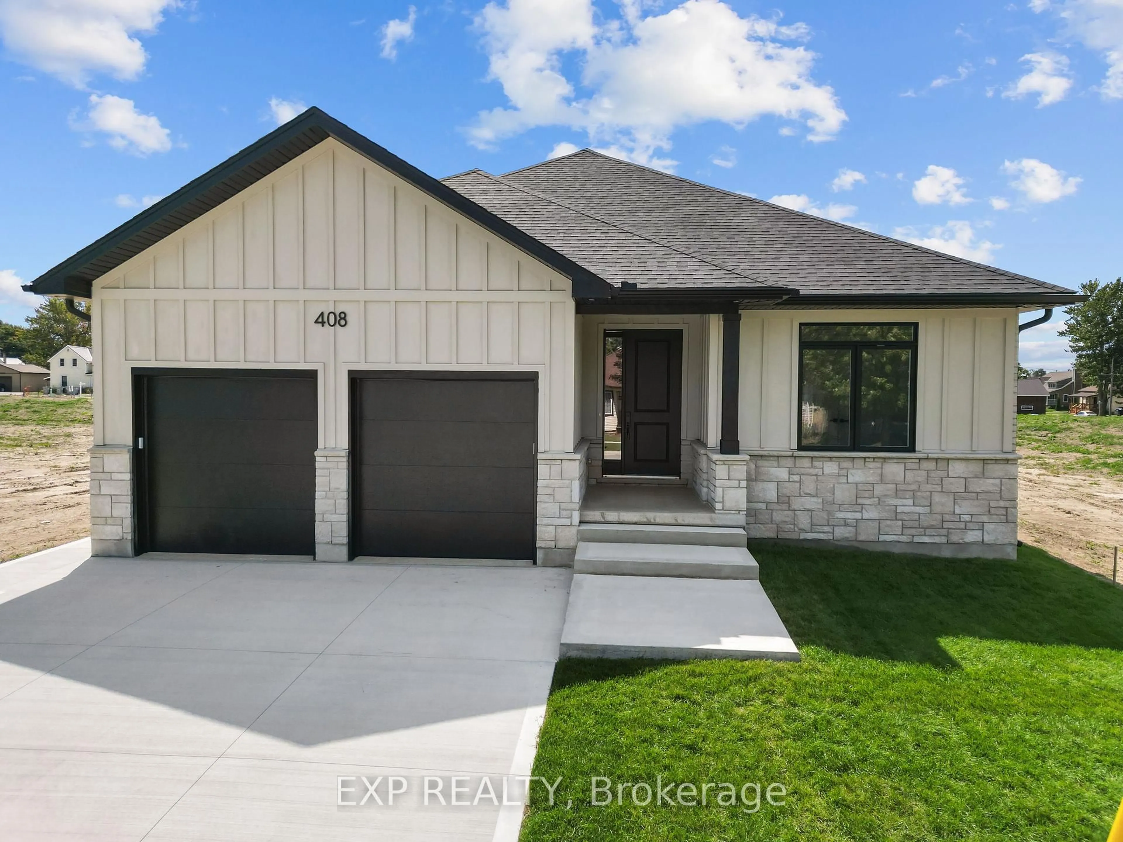 Home with brick exterior material, street for 408 Erie St, Warwick Ontario N0M 2S0