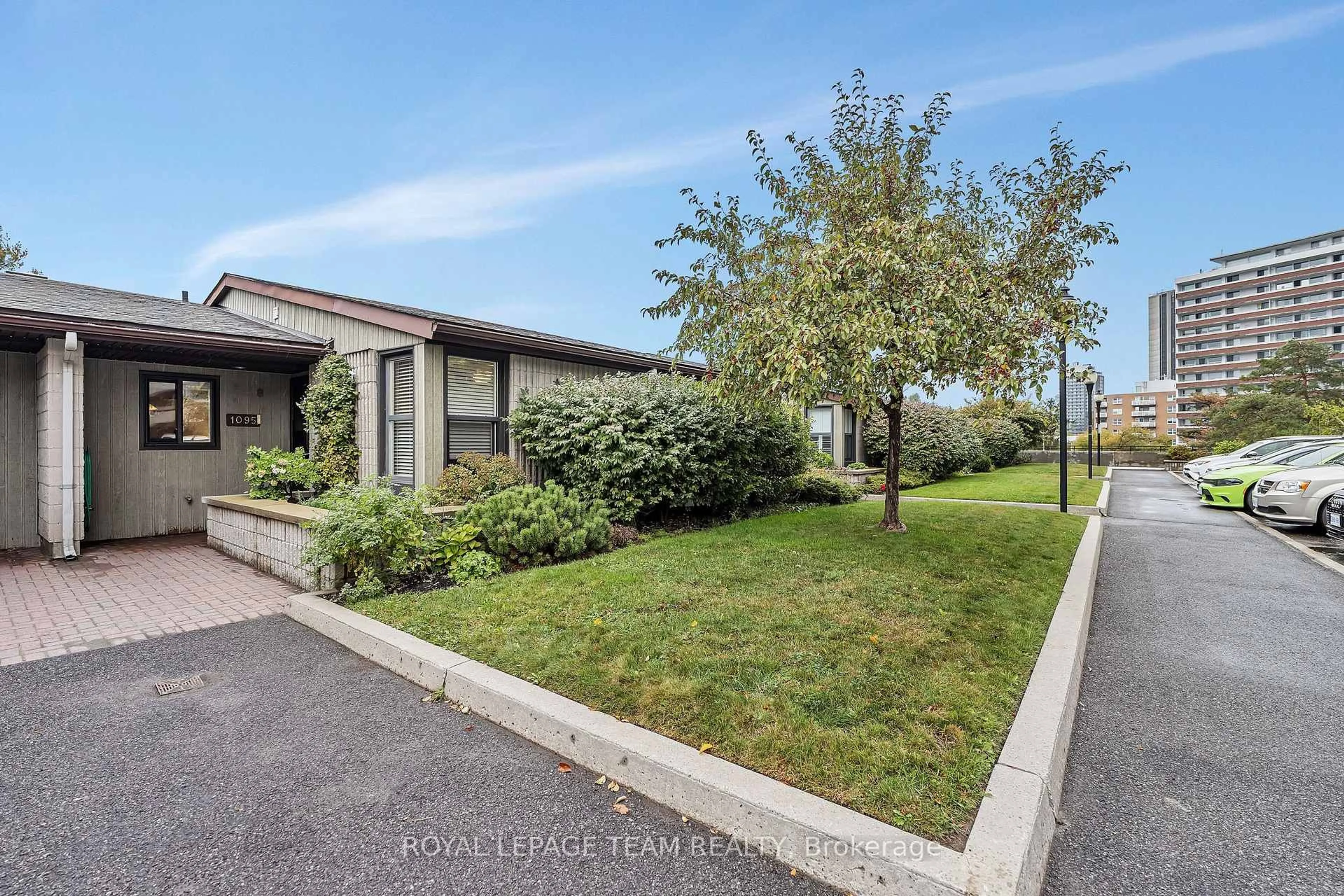 A pic from outside/outdoor area/front of a property/back of a property/a pic from drone, street for 1095 Ambleside Dr, Ottawa Ontario K2B 8E2