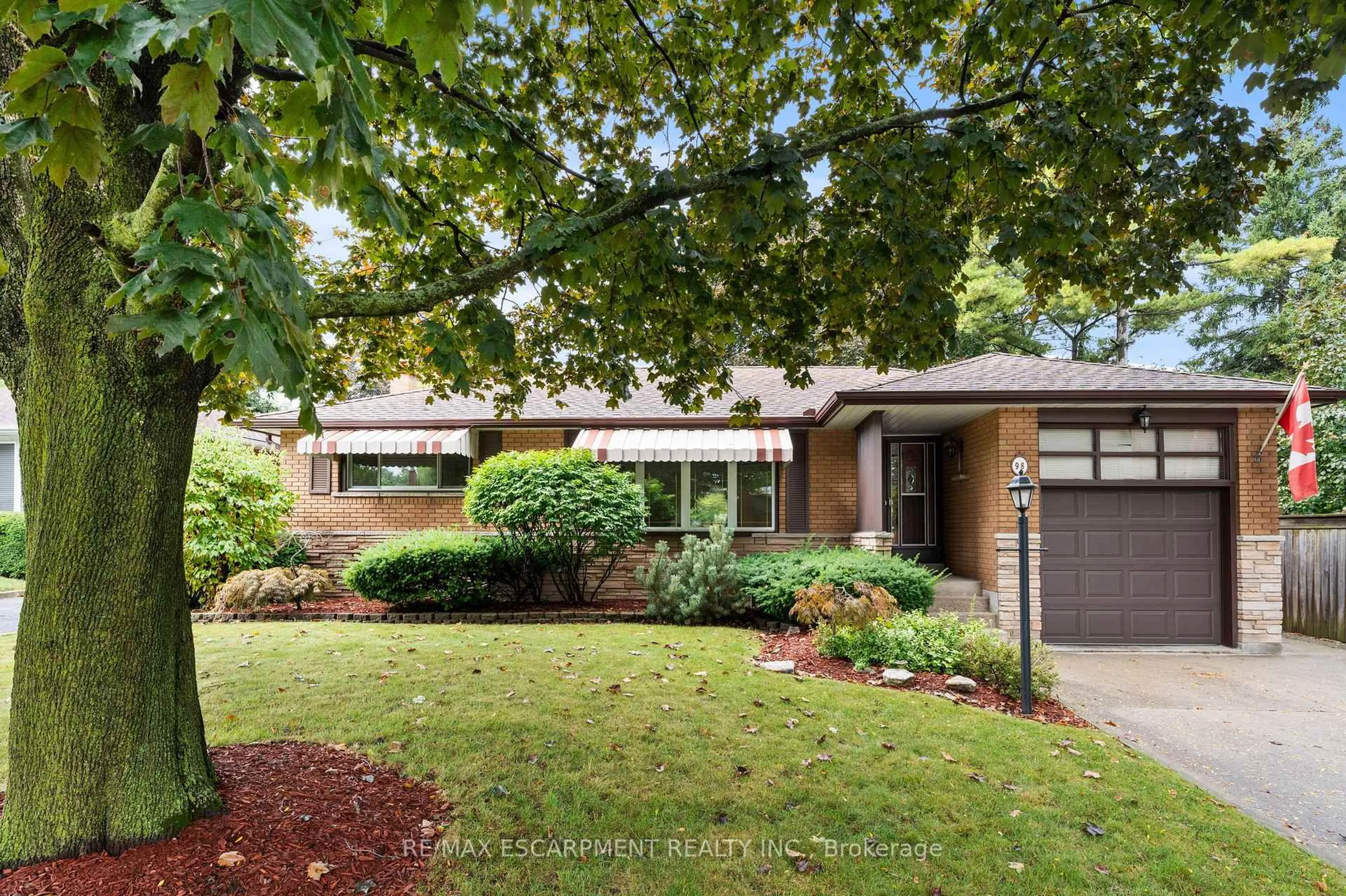 Home with brick exterior material, street for 98 Laurier Ave, Hamilton Ontario L9C 3S4