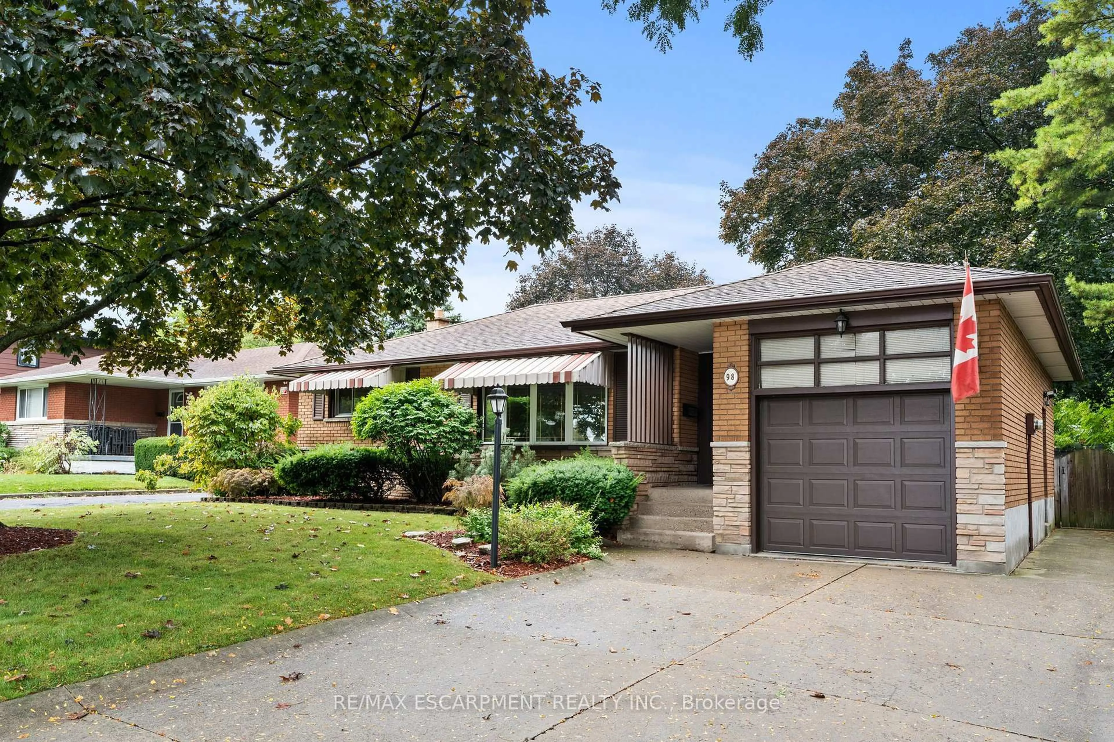 Home with brick exterior material, street for 98 Laurier Ave, Hamilton Ontario L9C 3S4
