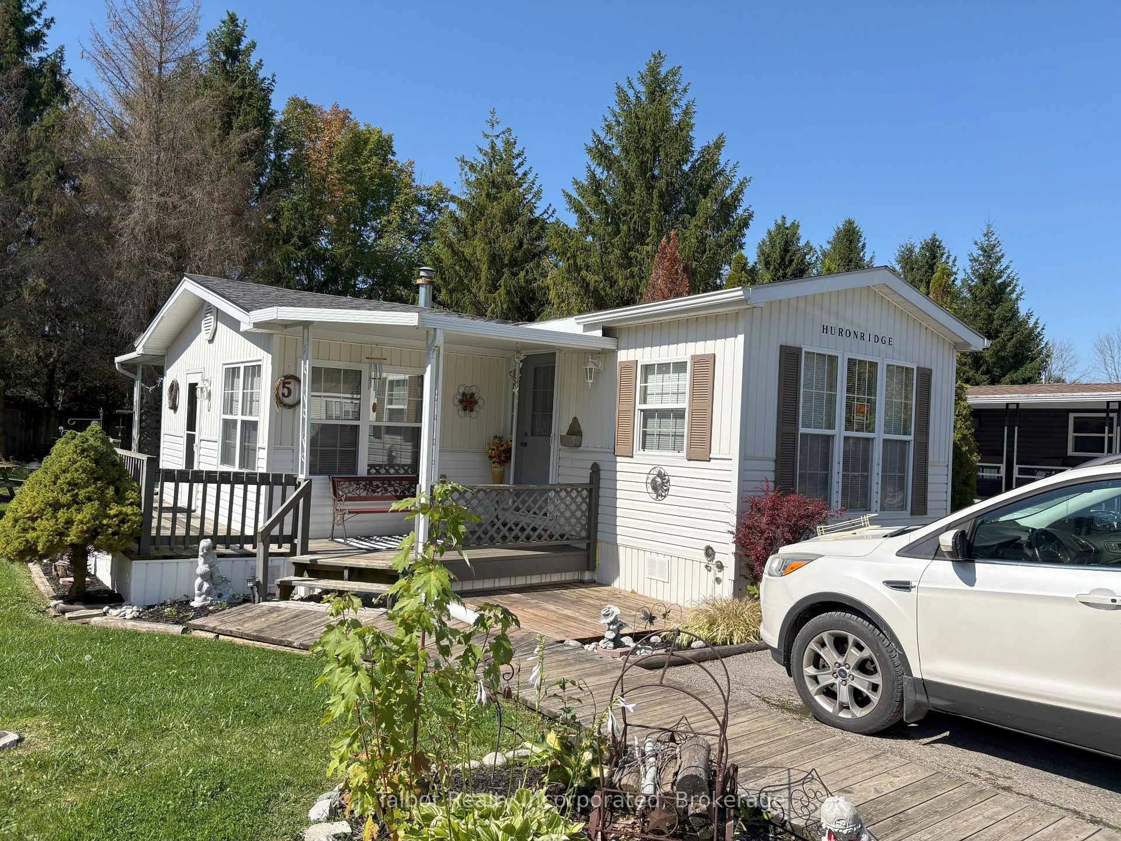 Home with vinyl exterior material, street for 77719 Bluewater Hwy - 5 Starboard St, Bluewater Ontario N0M 1G0