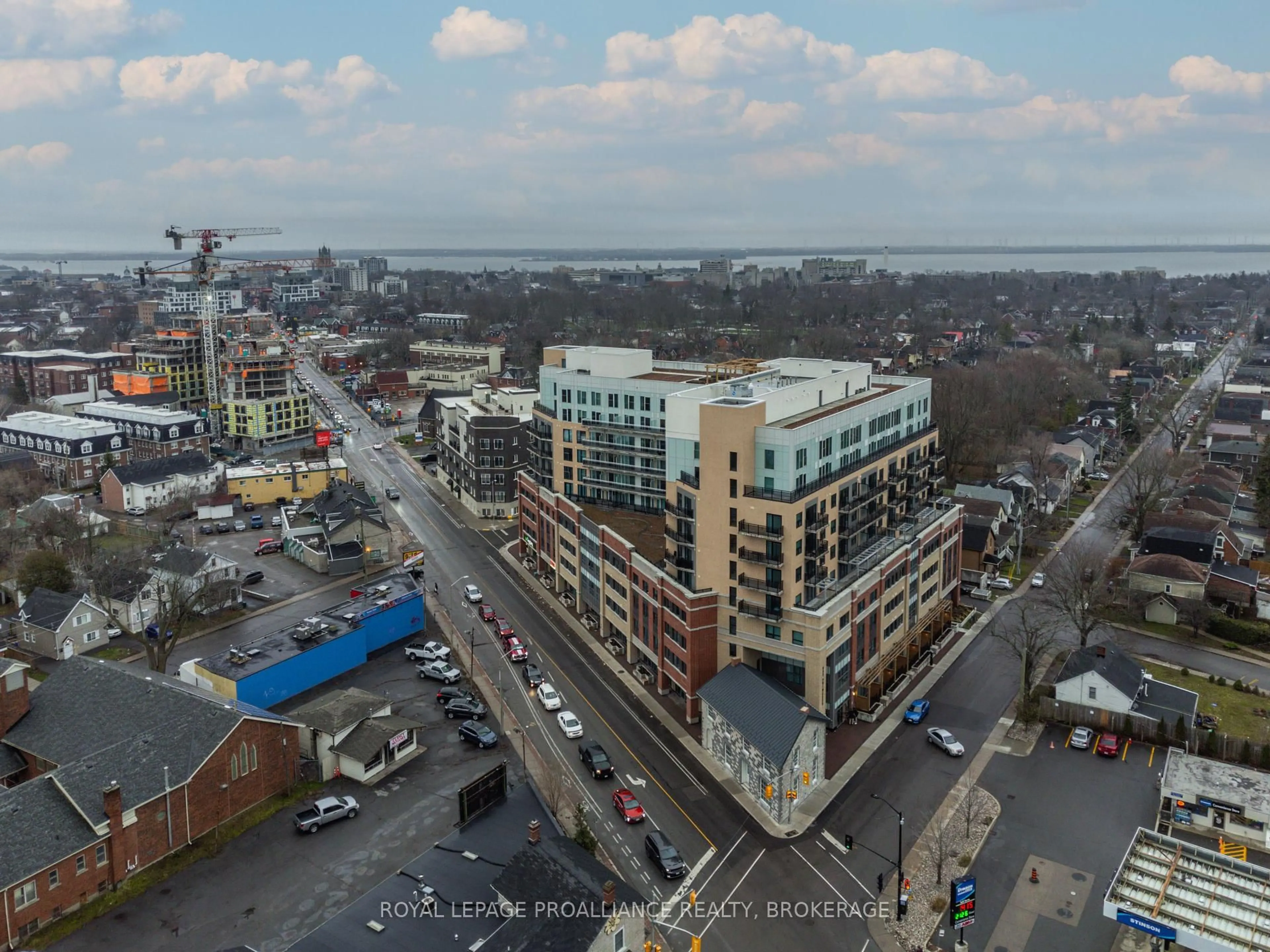 A pic from outside/outdoor area/front of a property/back of a property/a pic from drone, city buildings view from balcony for 652 Princess St #207, Kingston Ontario K7L 3Z9