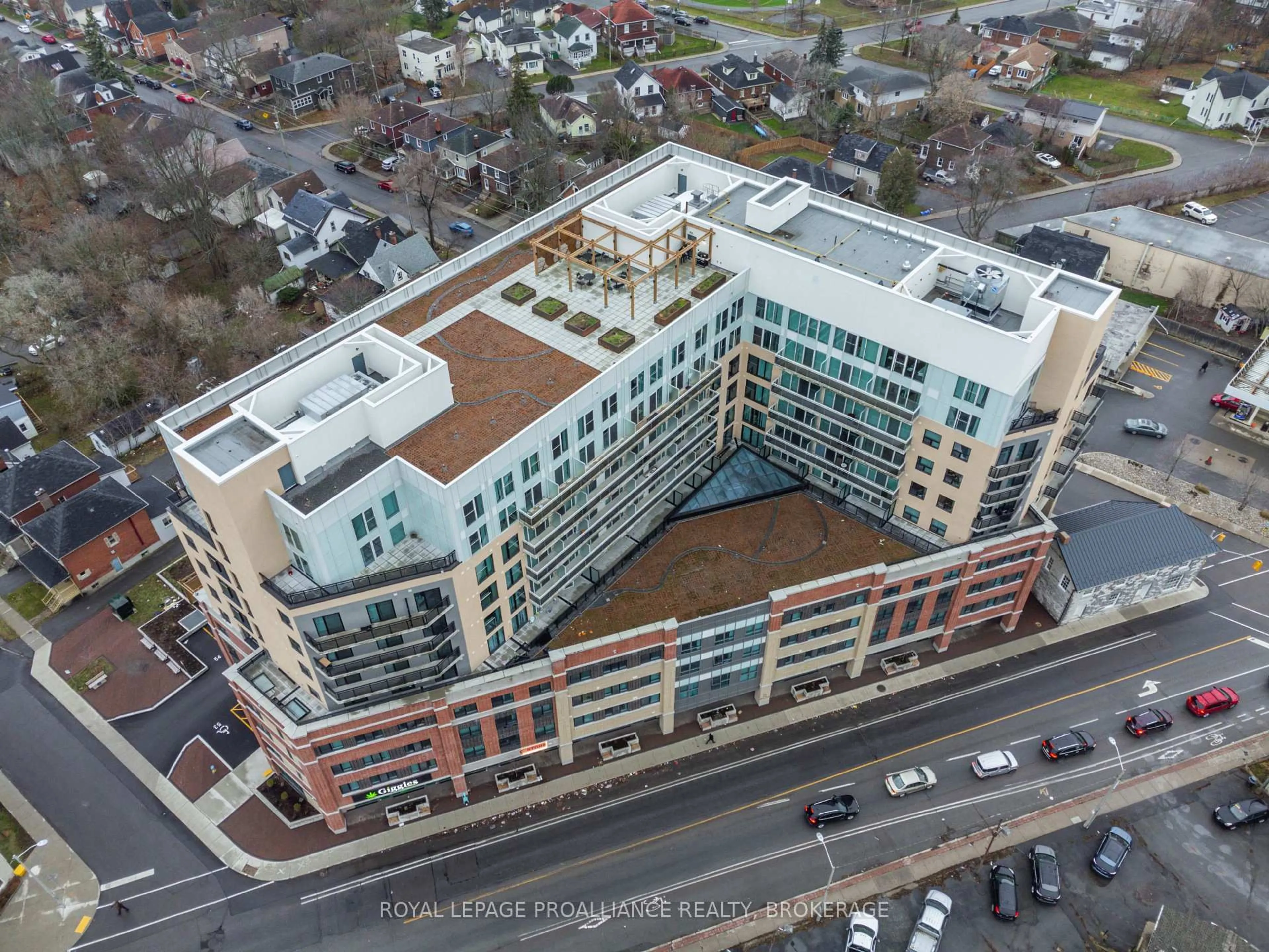 A pic from outside/outdoor area/front of a property/back of a property/a pic from drone, building for 652 Princess St #207, Kingston Ontario K7L 3Z9