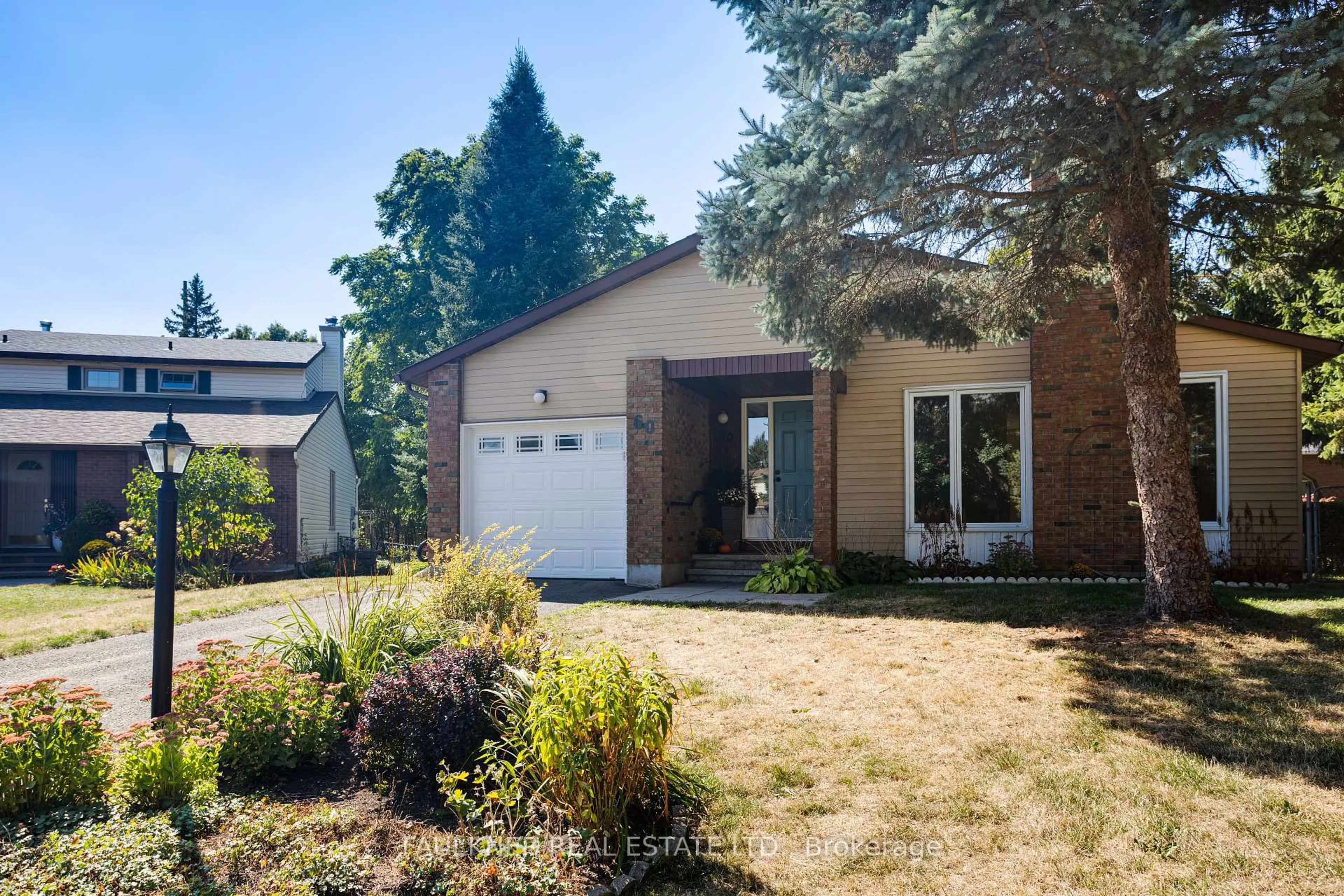 Home with brick exterior material, street for 60 Melville Dr, Ottawa Ontario K2J 2E1