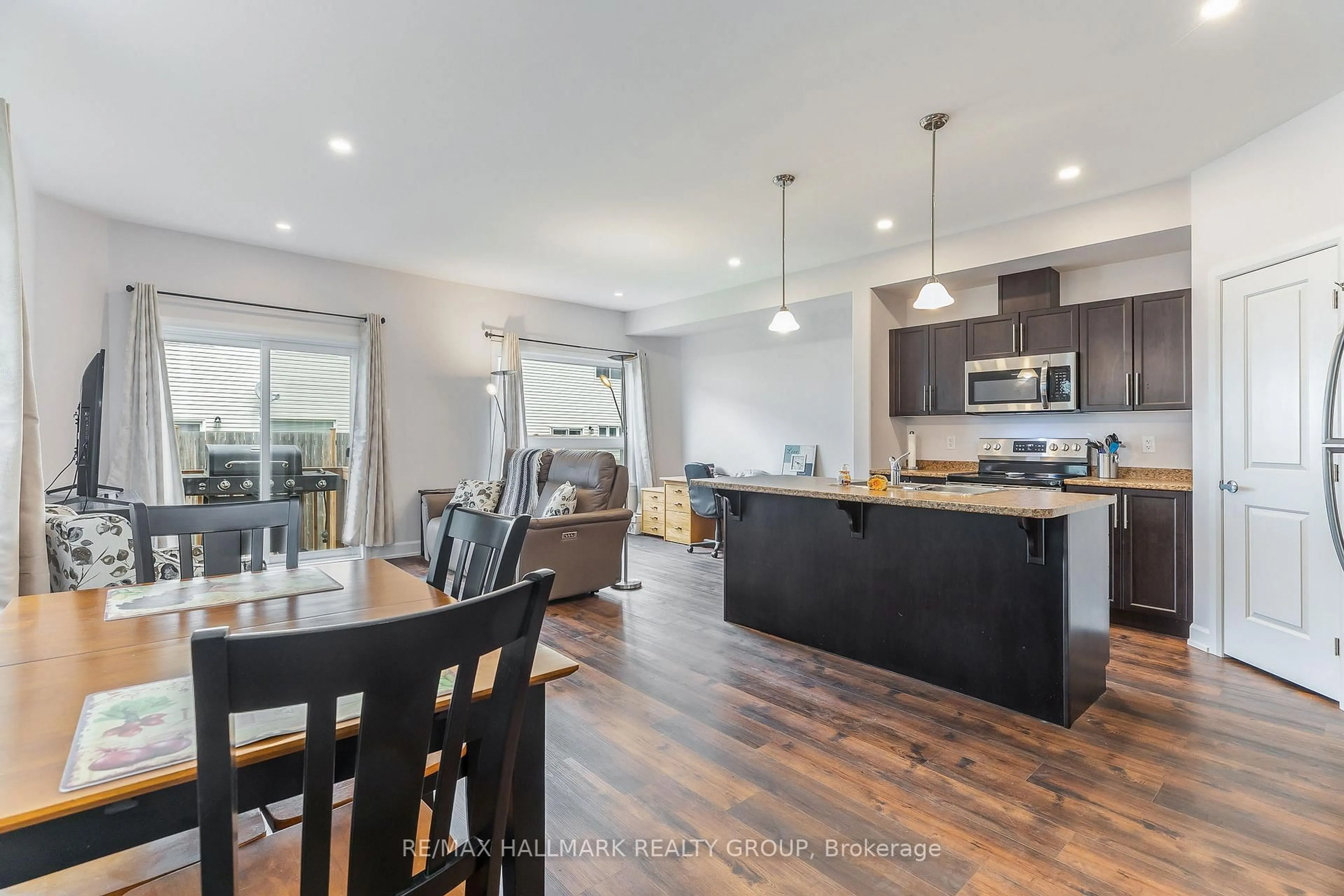 Open concept kitchen, wood/laminate floor for 90 Vimy Ridge Cres, Arnprior Ontario K7S 0H7