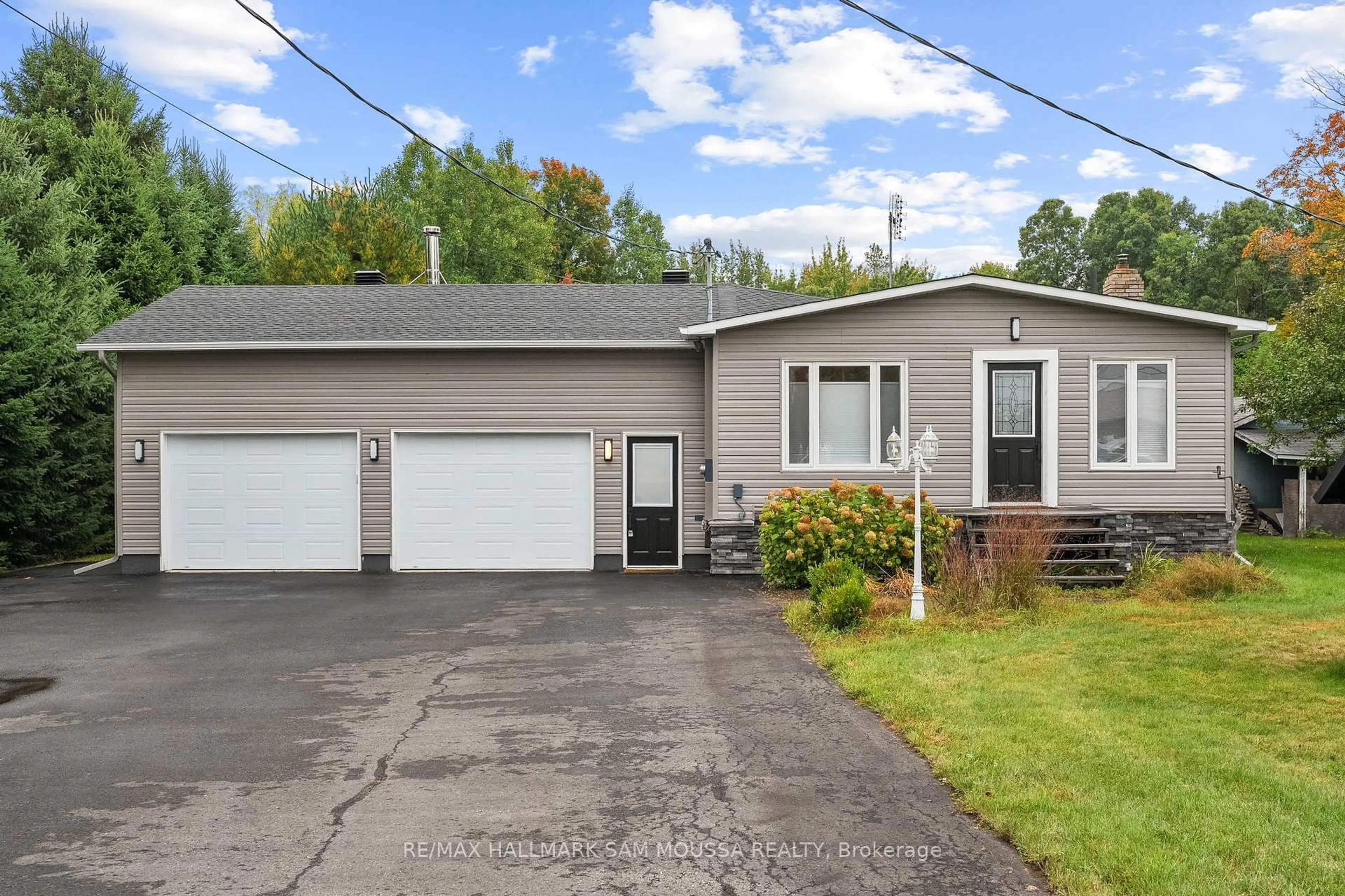 Home with vinyl exterior material, street for 2039 Des Pins St, The Nation Ontario K0A 2M0