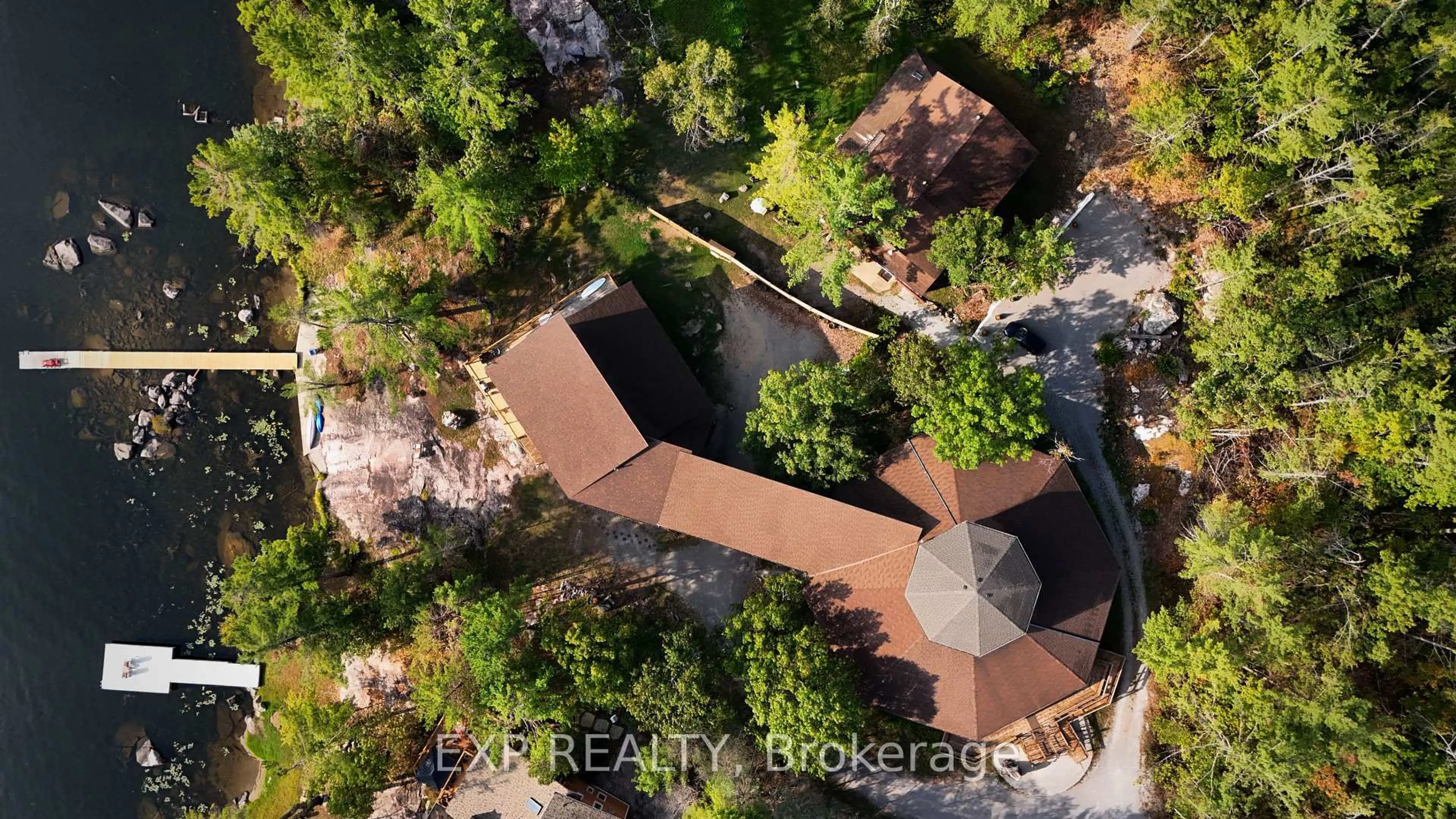 A pic from outside/outdoor area/front of a property/back of a property/a pic from drone, unknown for 65 Fire Route 21, Trent Lakes Ontario K0L 1J0
