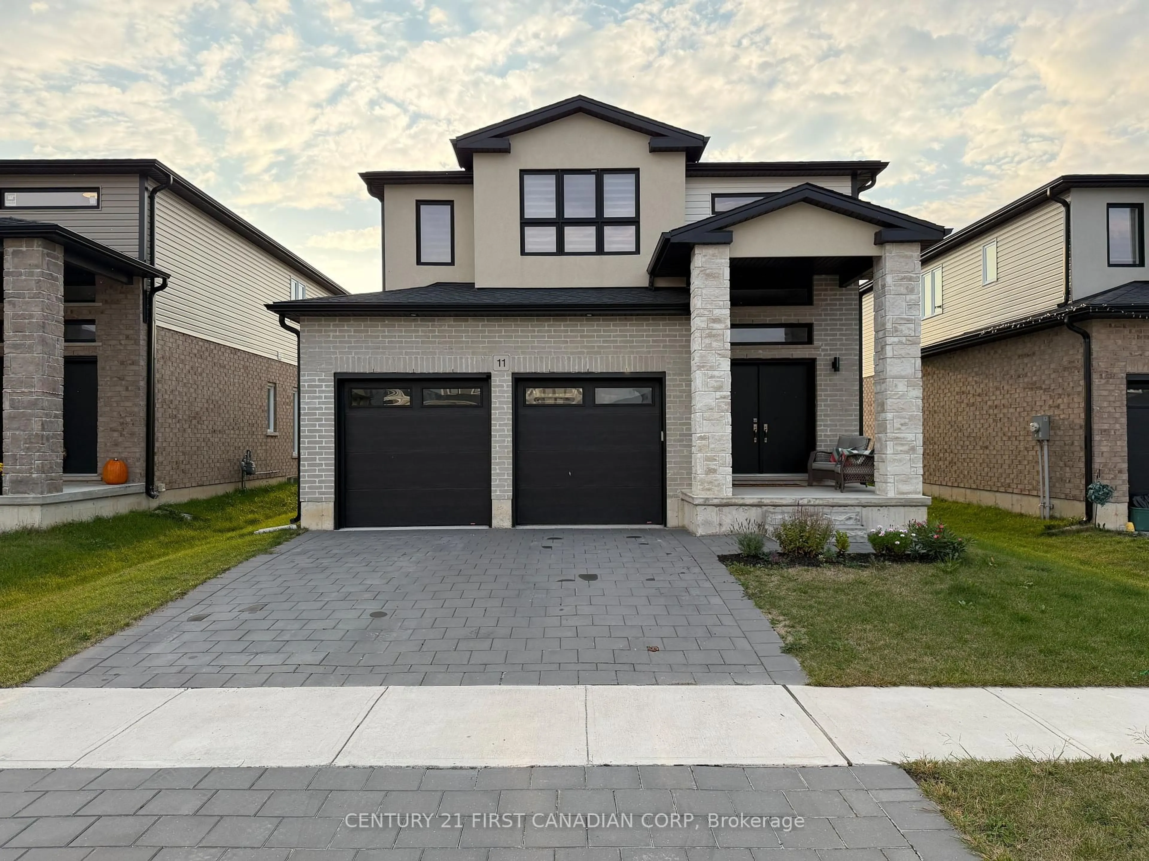 Home with brick exterior material, street for 11 Triebner St, South Huron Ontario N0M 1S2