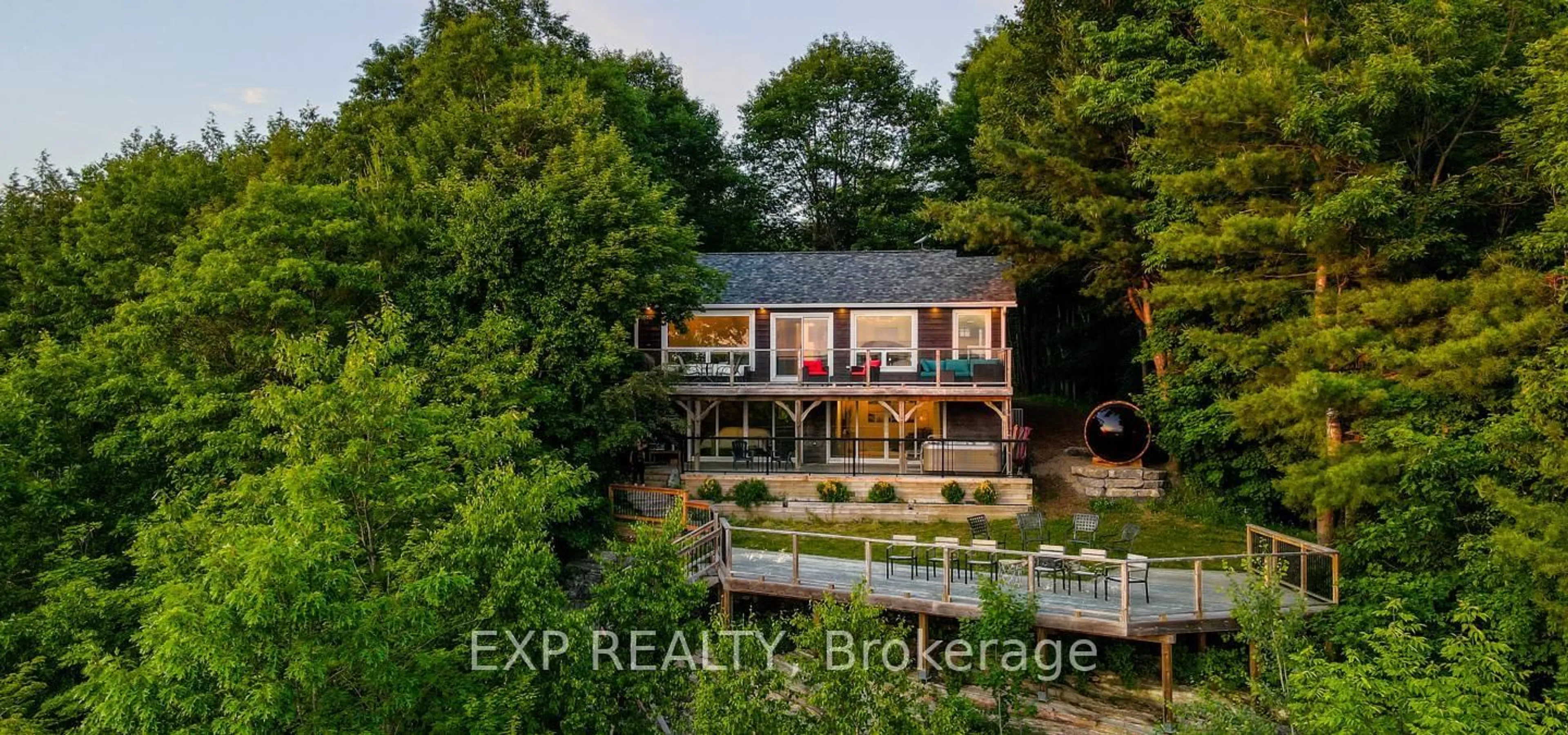 A pic from outside/outdoor area/front of a property/back of a property/a pic from drone, water/lake/river/ocean view for 1047 WHYMAN Rd, Algonquin Highlands Ontario K0M 1J2