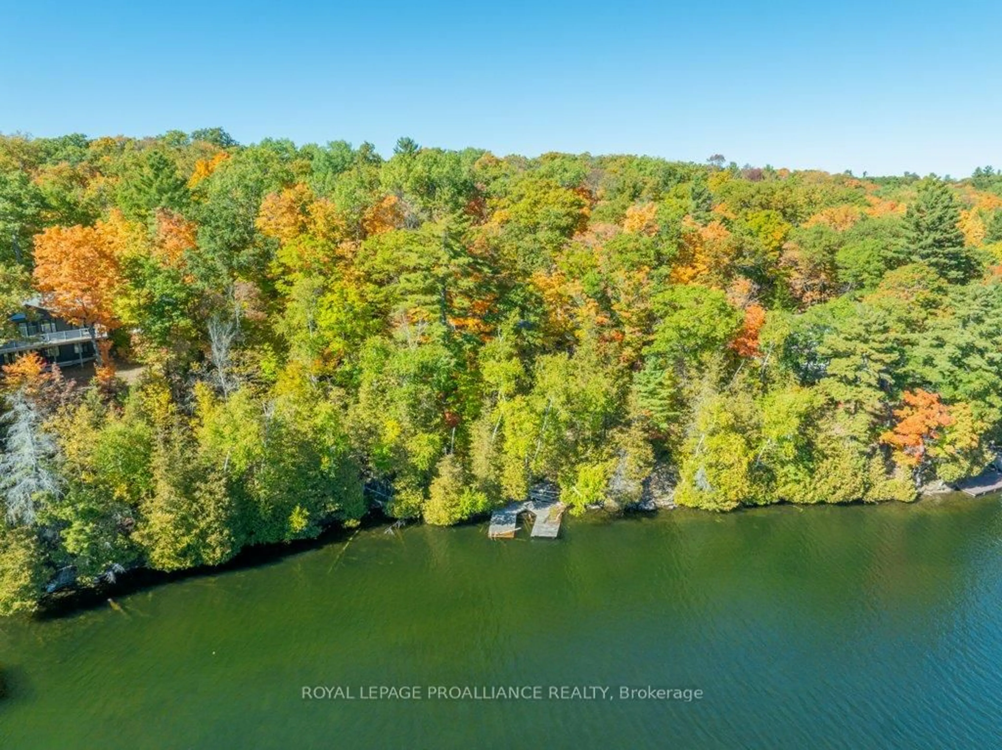 A pic from outside/outdoor area/front of a property/back of a property/a pic from drone, water/lake/river/ocean view for 1042 East Flieler Lane, Cloyne Ontario K0H 1K0
