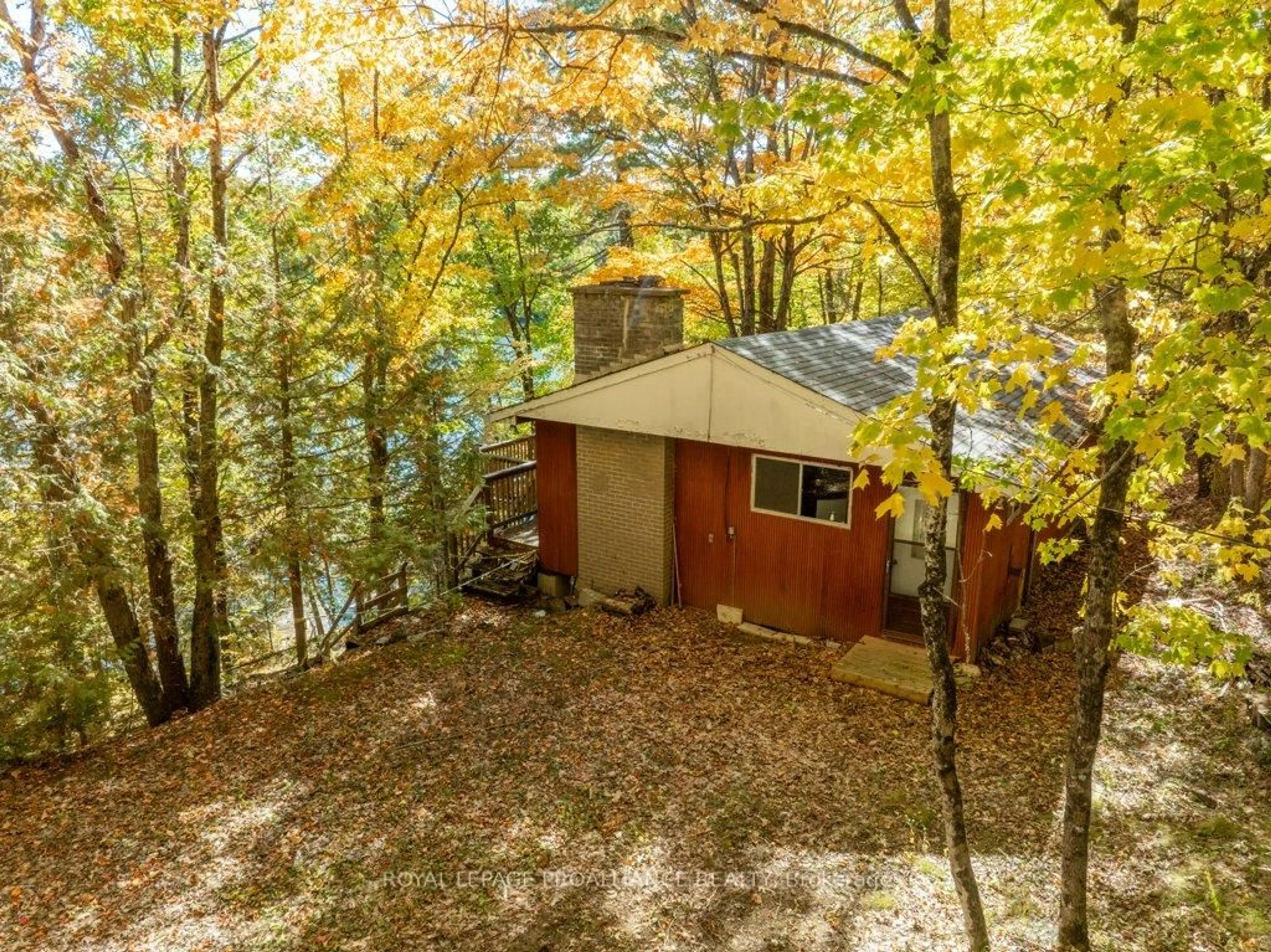 A pic from outside/outdoor area/front of a property/back of a property/a pic from drone, water/lake/river/ocean view for 1042 East Flieler Lane, Cloyne Ontario K0H 1K0