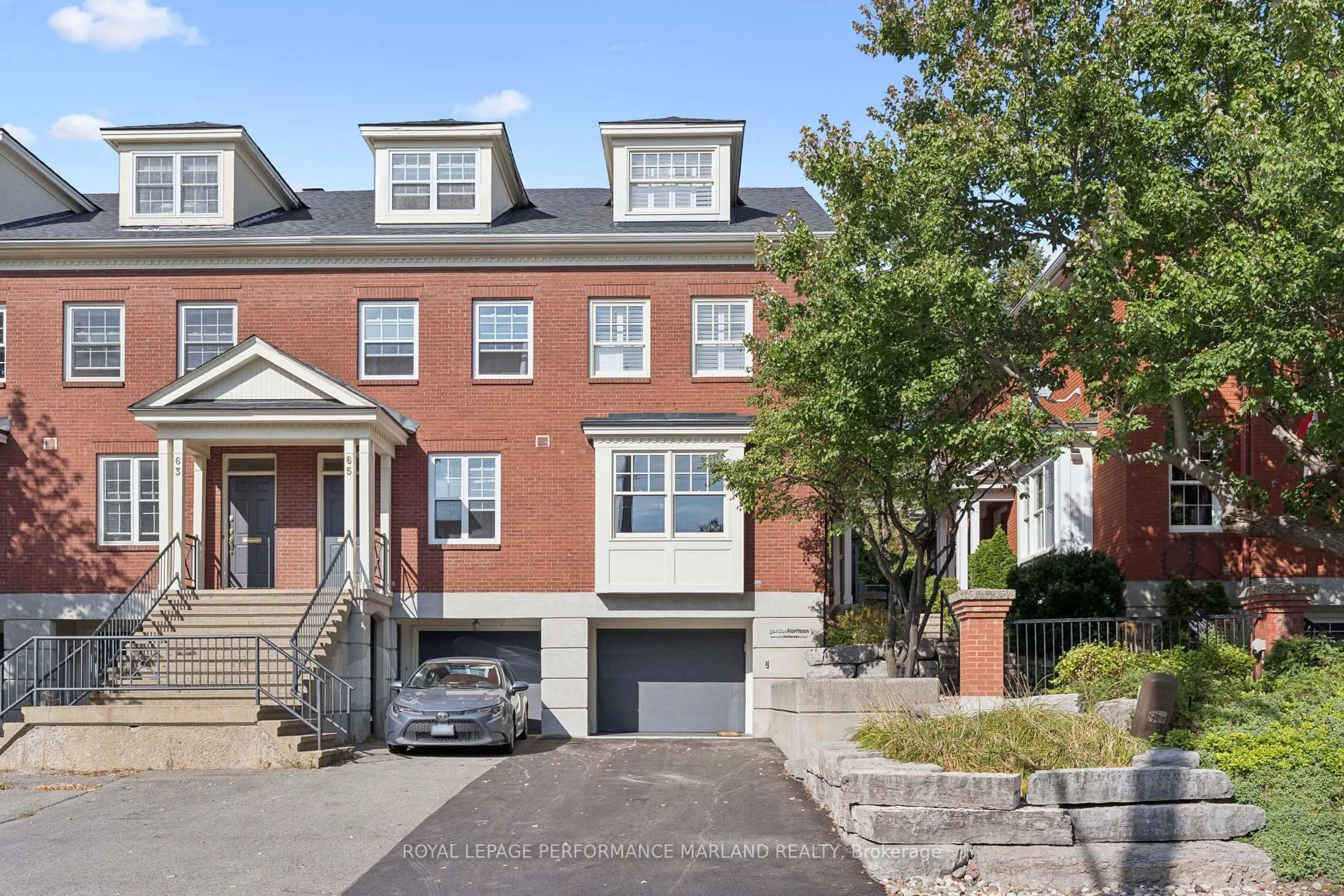 Home with brick exterior material, street for 67 Rideau Terr, Ottawa Ontario K1M 2A2