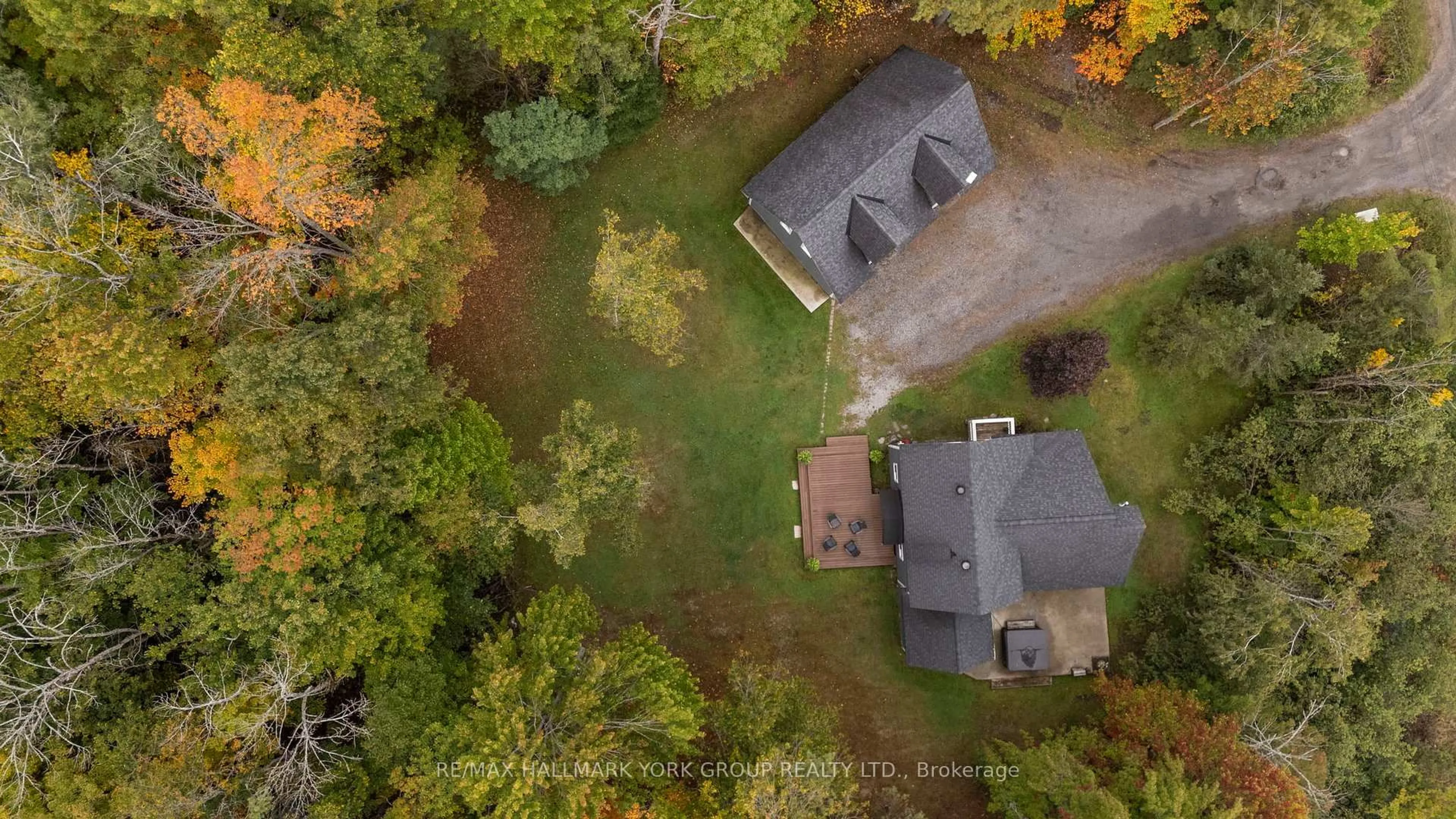 A pic from outside/outdoor area/front of a property/back of a property/a pic from drone, forest/trees view for 1628 Muskoka Rd, Gravenhurst Ontario P1P 1R5