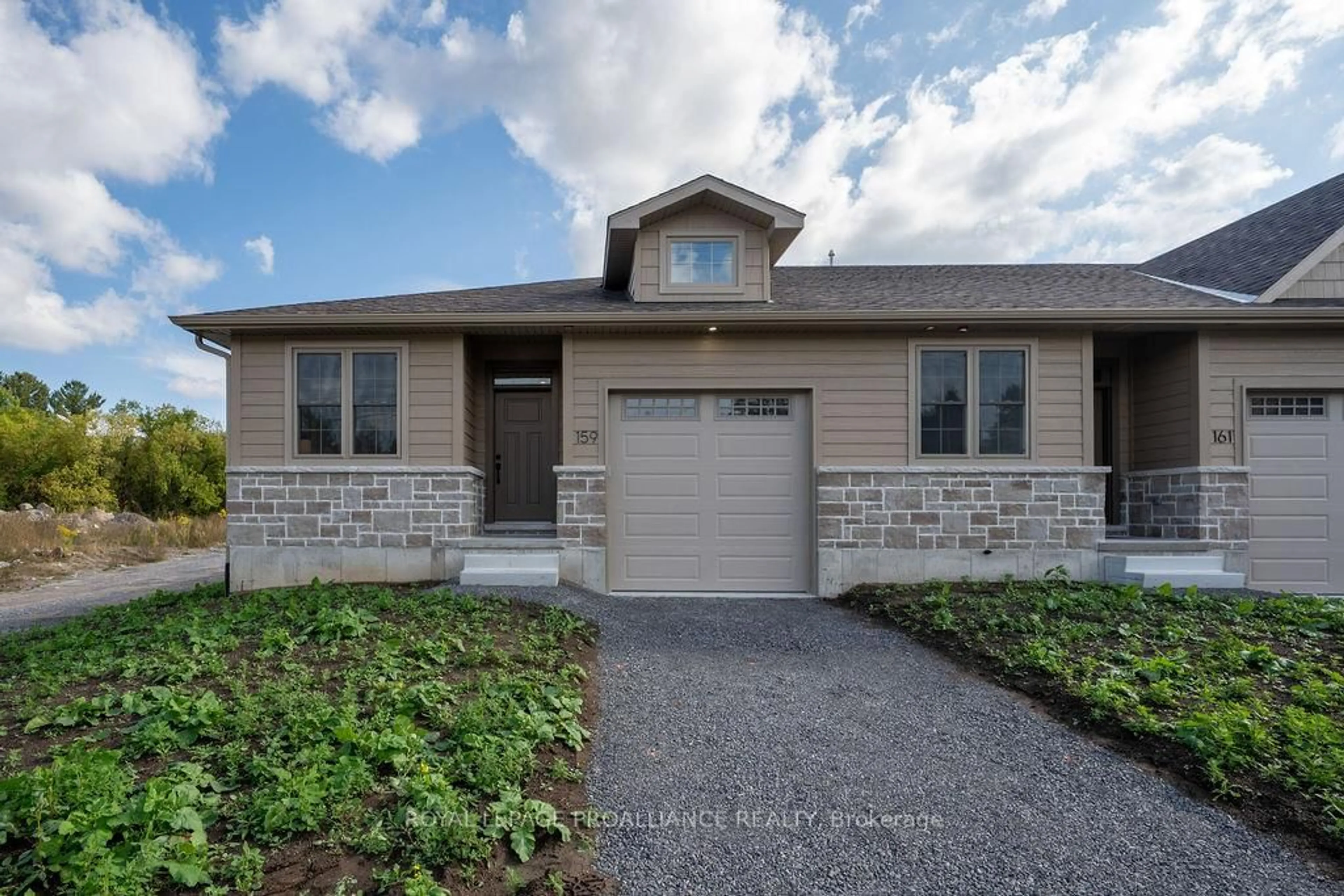 Home with vinyl exterior material, street for 159 Pomeroy Ave, Tweed Ontario K0K 3J0