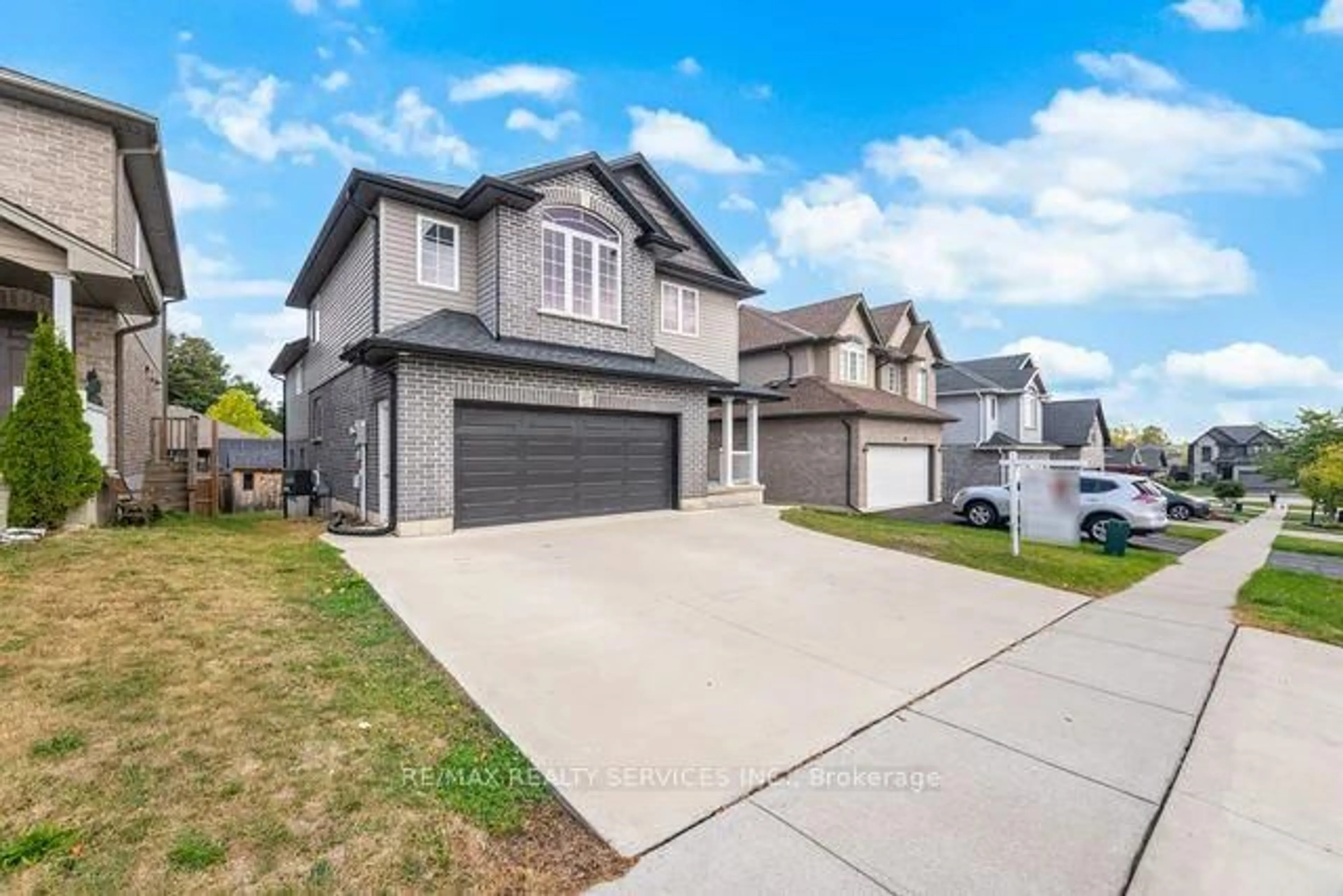 Home with vinyl exterior material, street for 419 Alan Cres, Woodstock Ontario N4S 0B9