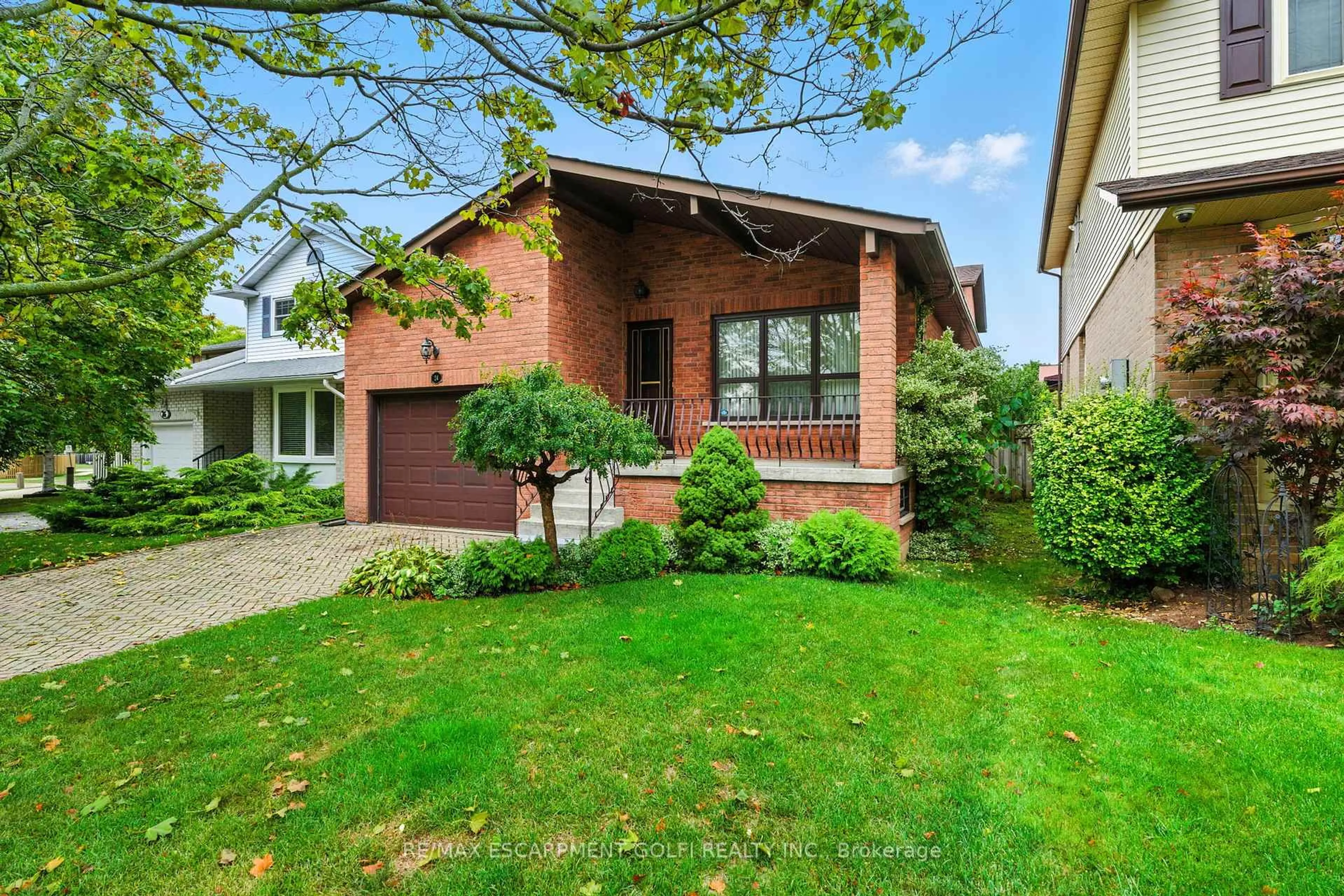 Home with brick exterior material, street for 24 Ellington Ave, Hamilton Ontario L8E 4E9