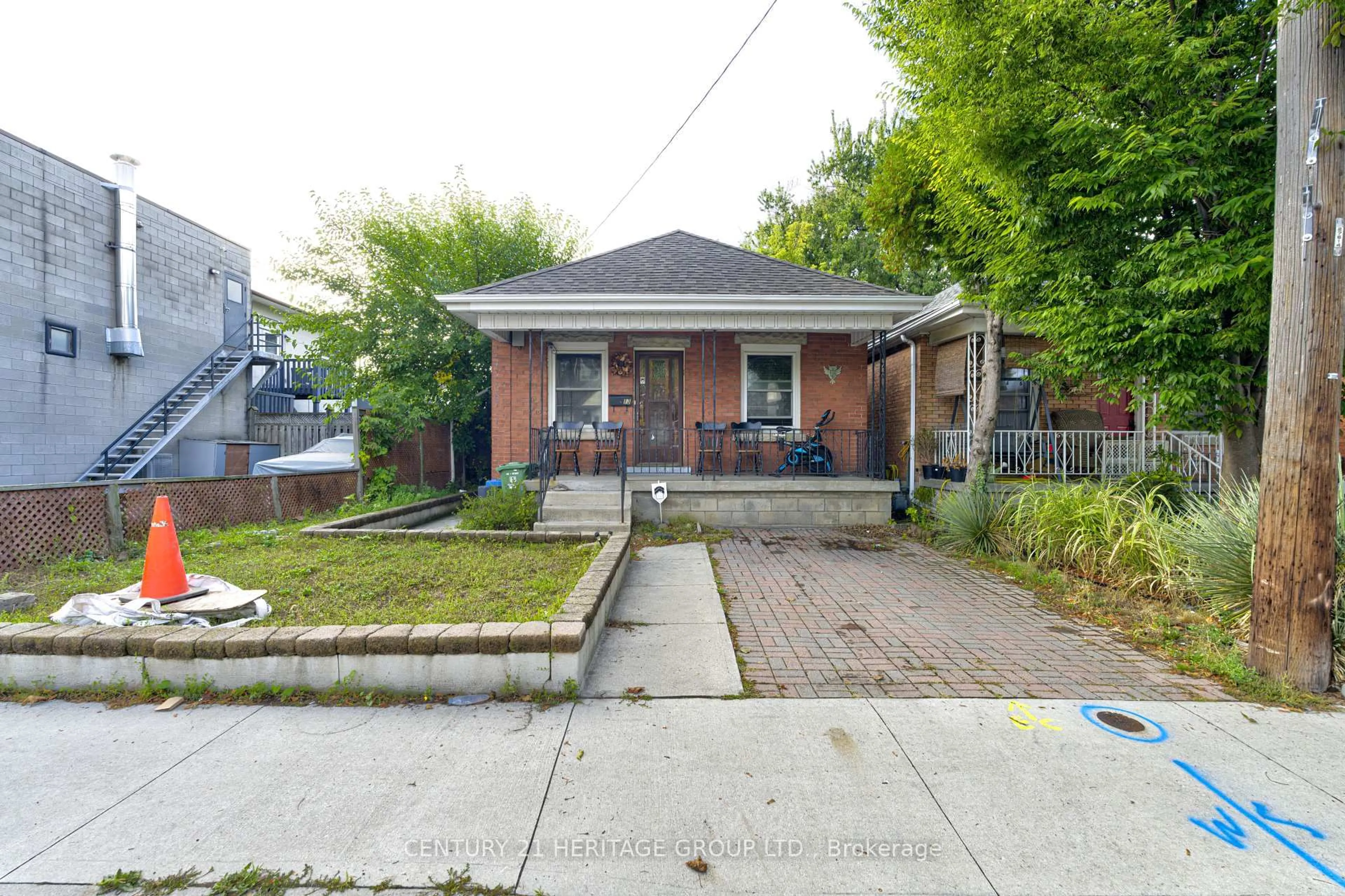 Home with brick exterior material, street for 13 Cameron Ave, Hamilton Ontario L8H 4Y9