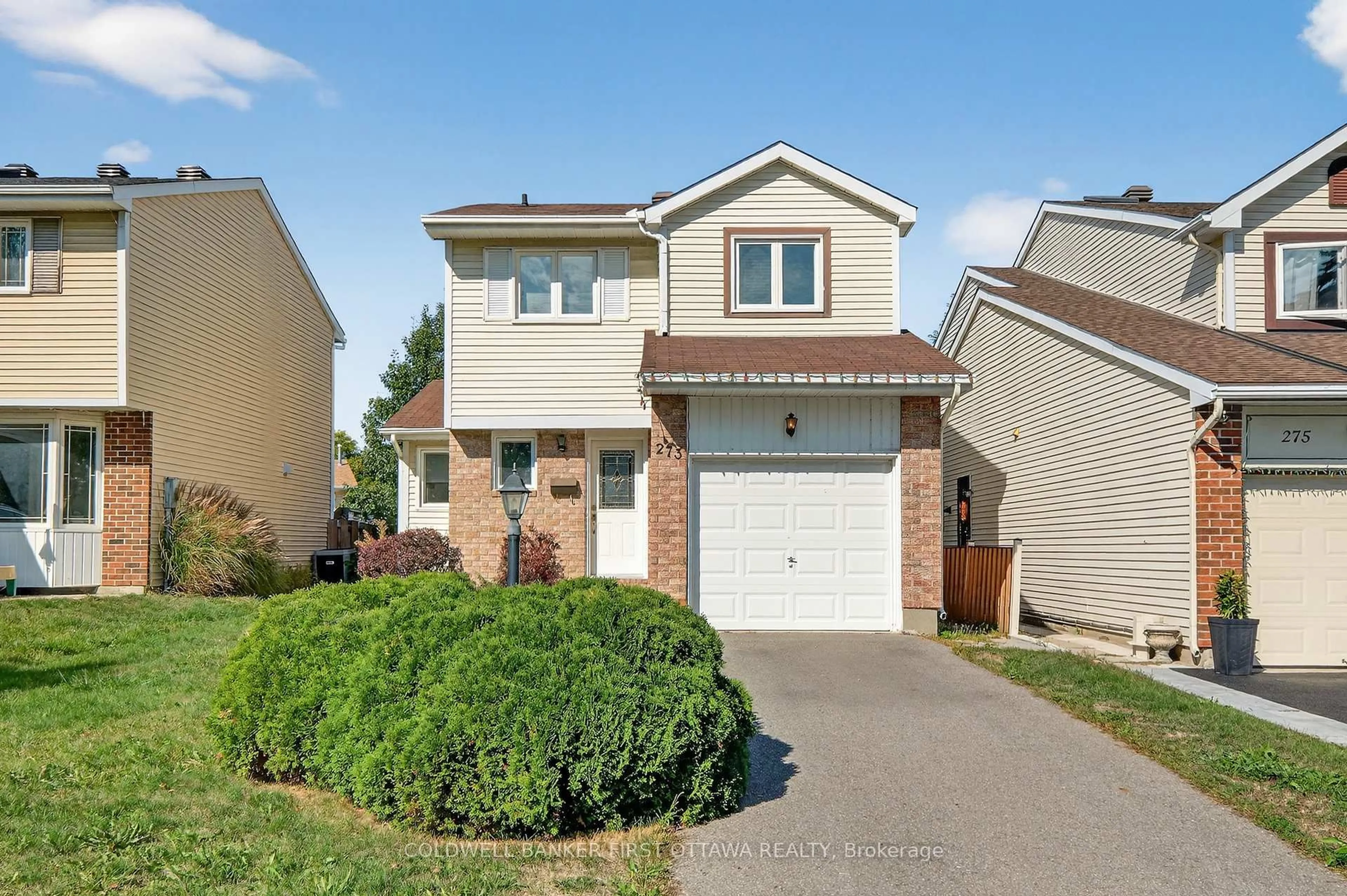 Home with vinyl exterior material, street for 273 Kinglet Way, Orleans Ontario K1E 2T9