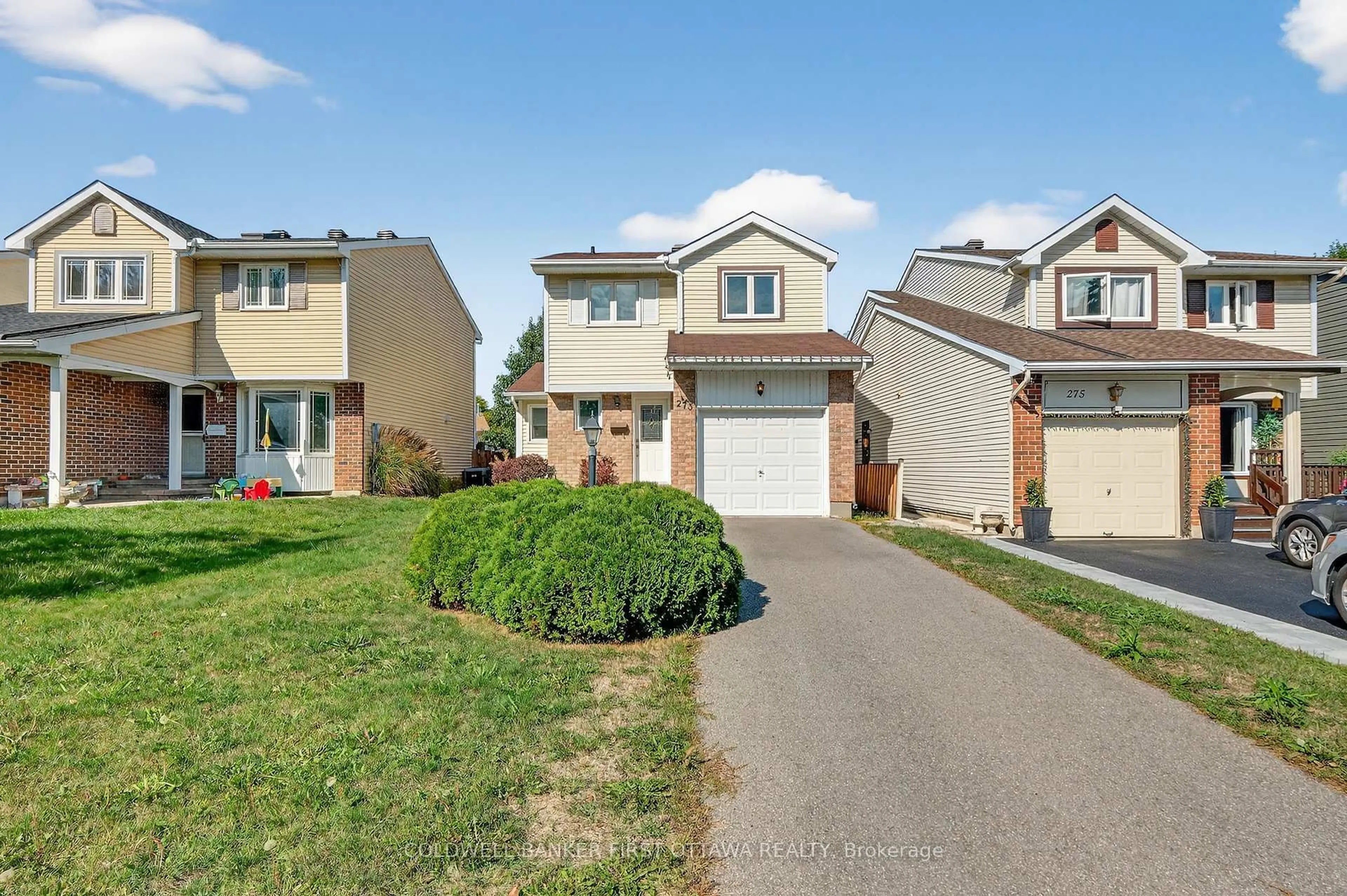 Home with vinyl exterior material, street for 273 Kinglet Way, Orleans Ontario K1E 2T9