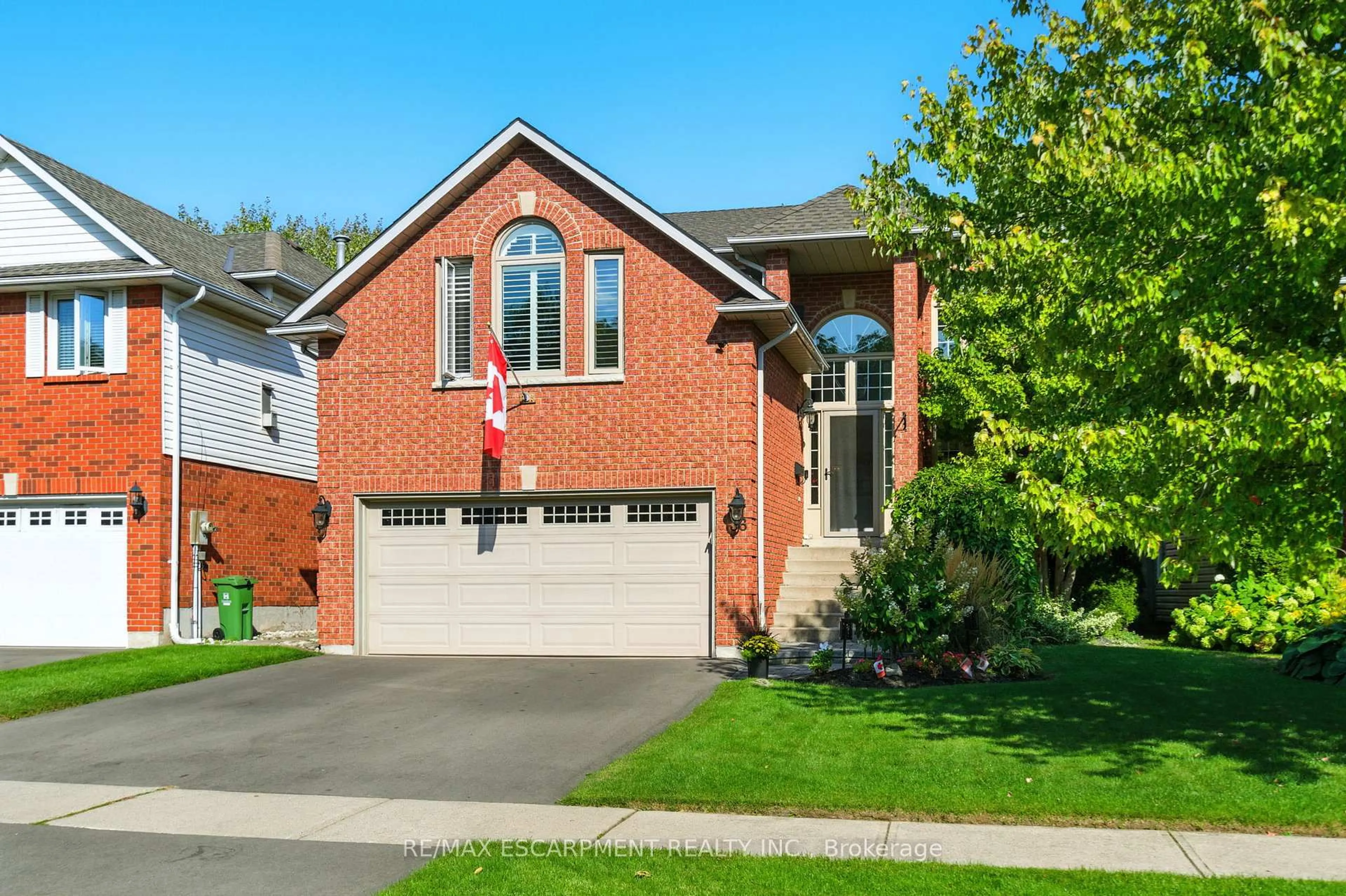 Home with brick exterior material, street for 36 Pinecreek Rd, Hamilton Ontario L0R 2H5