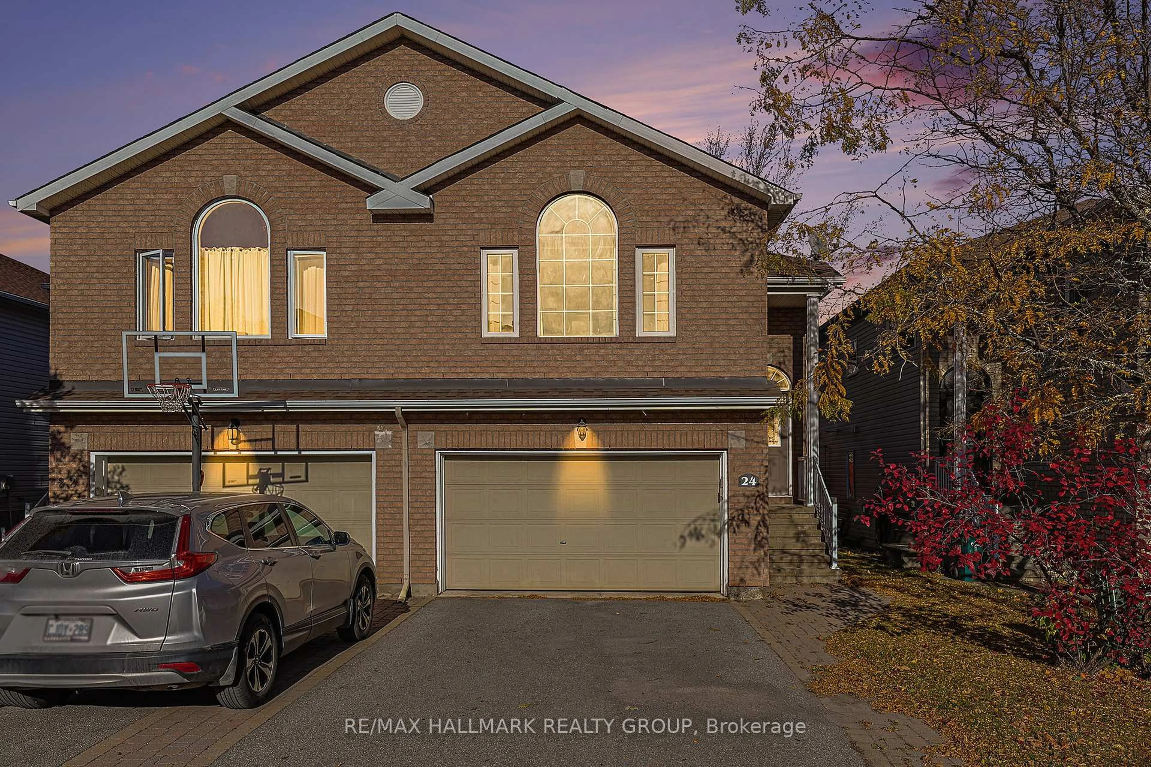 Home with brick exterior material, street for 24 Castle Glen Cres, Ottawa Ontario K2L 4H1