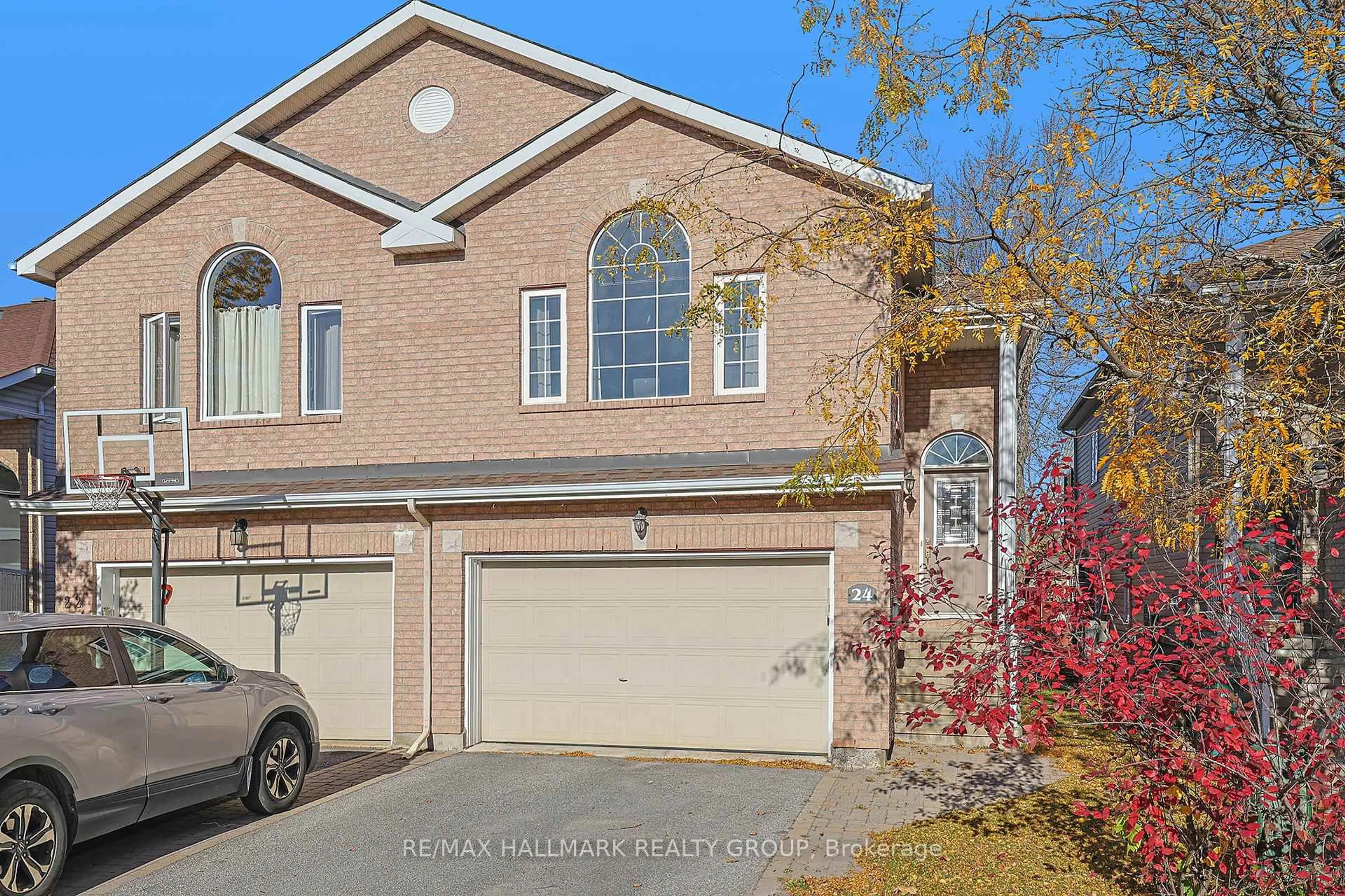 Home with brick exterior material, street for 24 Castle Glen Cres, Ottawa Ontario K2L 4H1