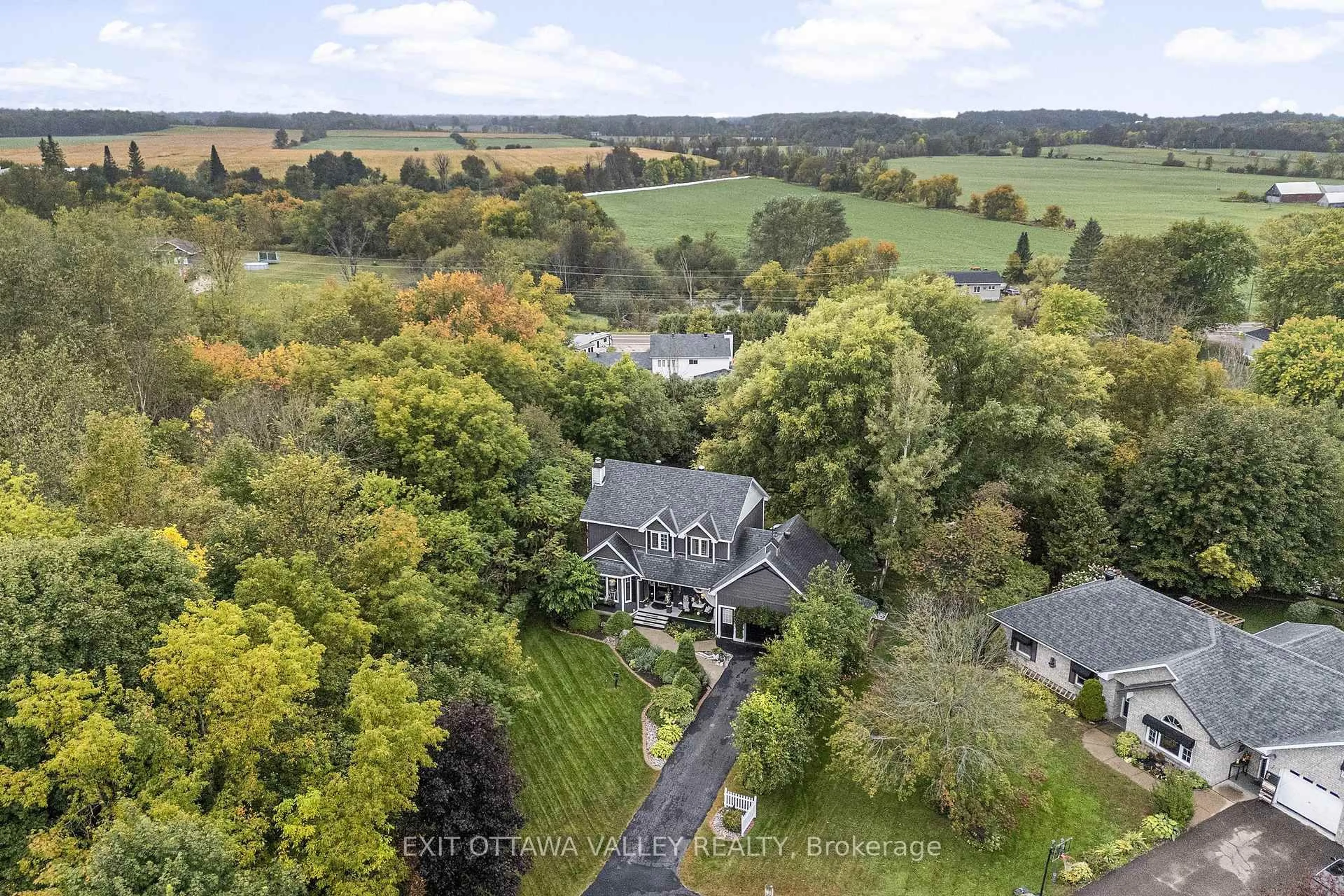 A pic from outside/outdoor area/front of a property/back of a property/a pic from drone, forest/trees view for 15 Hume St, Beachburg Ontario K0J 1C0