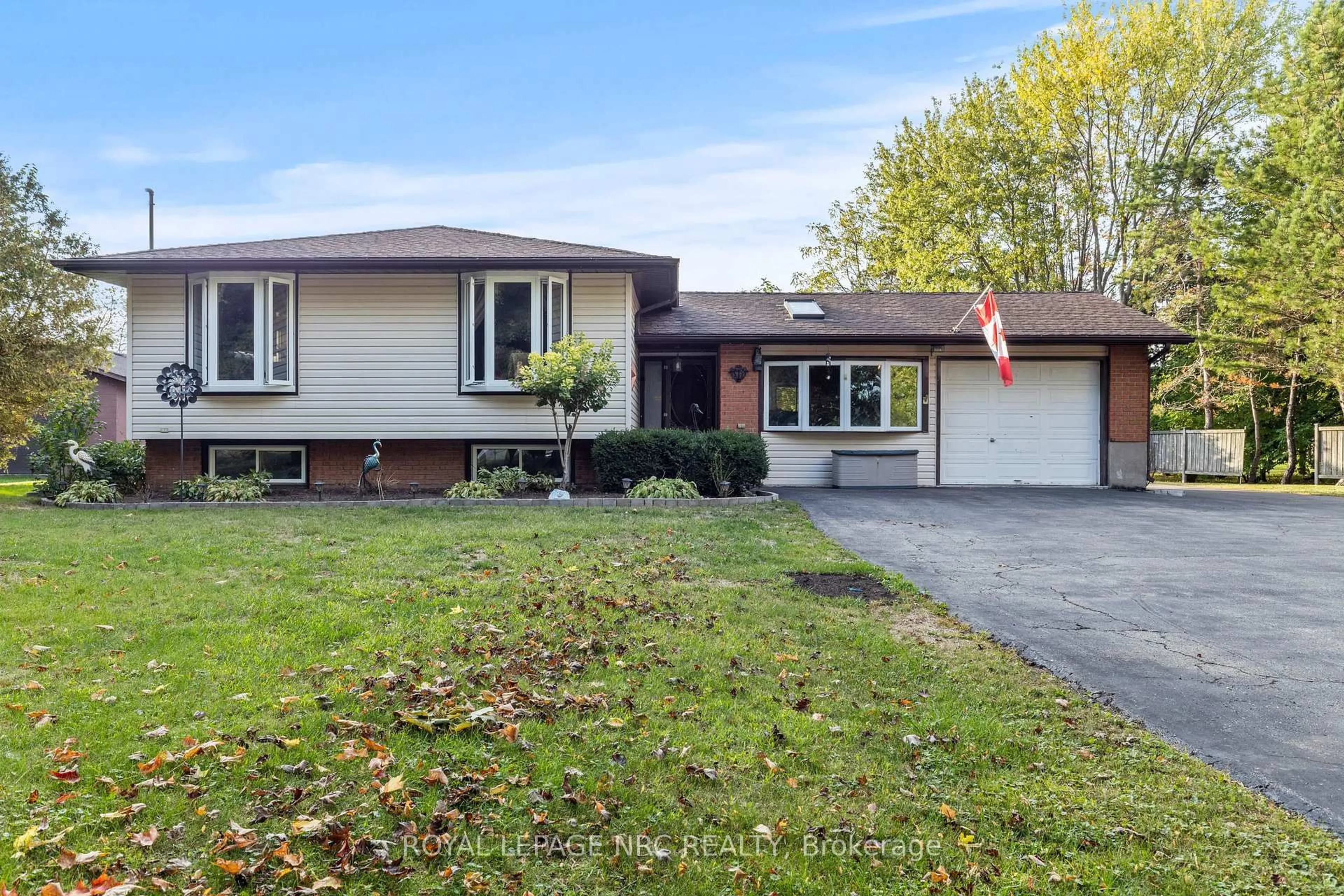 Home with vinyl exterior material, street for 12028 Augustine Rd, Wainfleet Ontario L0S 1V0