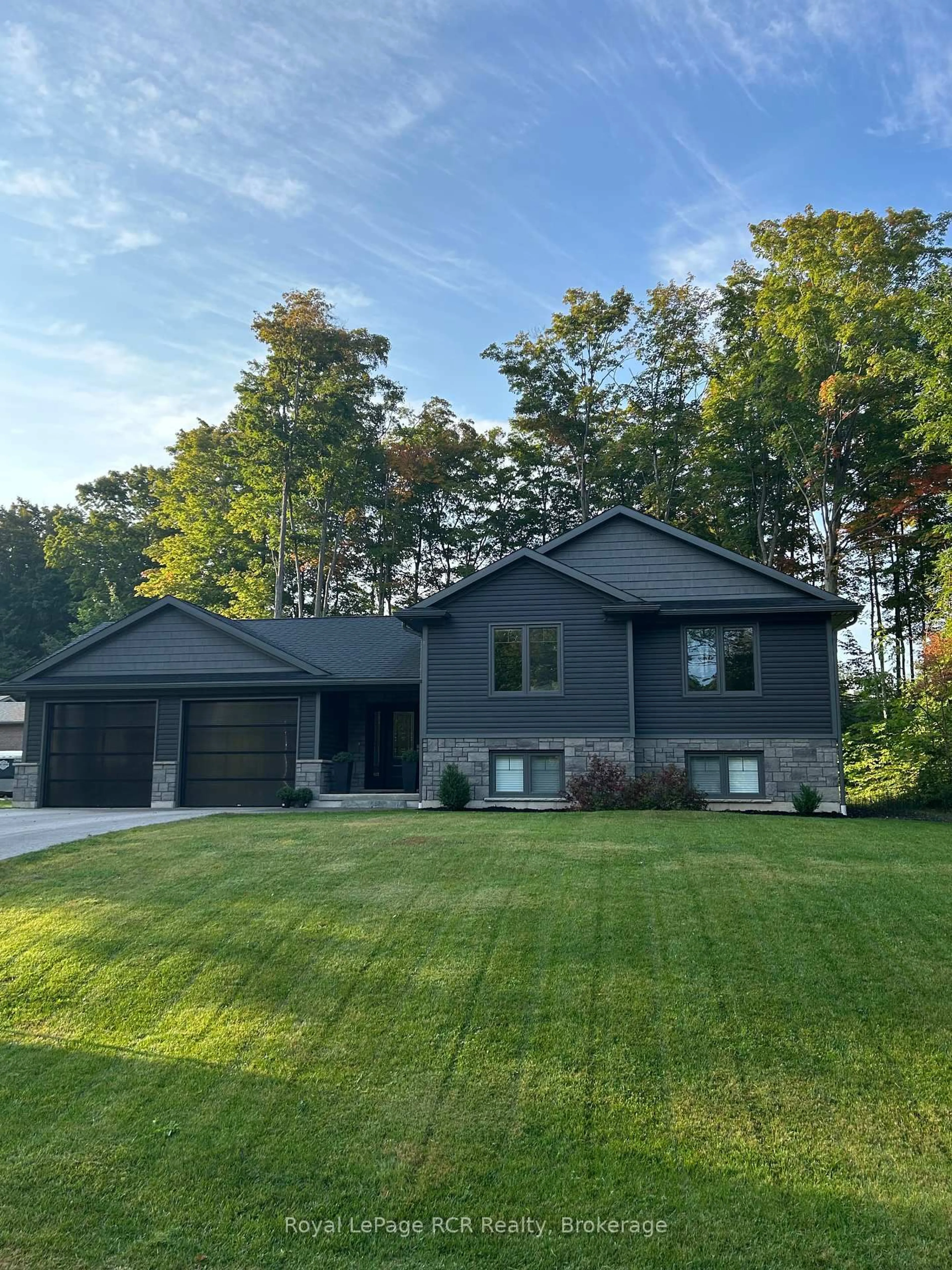 Home with vinyl exterior material, street for 52 Birch St, South Bruce Peninsula Ontario N0H 2G0