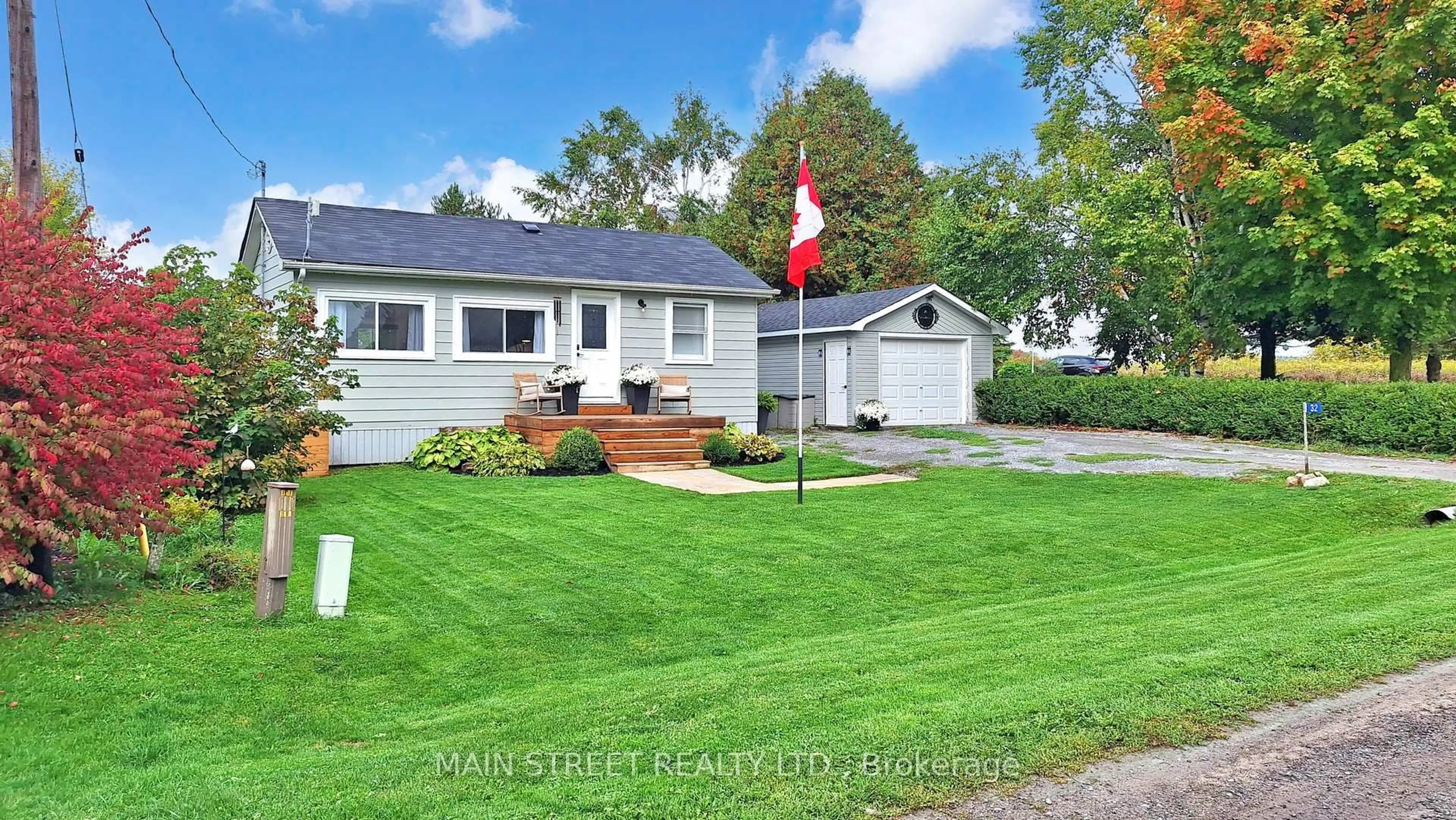 A pic from outside/outdoor area/front of a property/back of a property/a pic from drone, street for 32 Rhodes Ave, Kawartha Lakes Ontario L0C 1G0