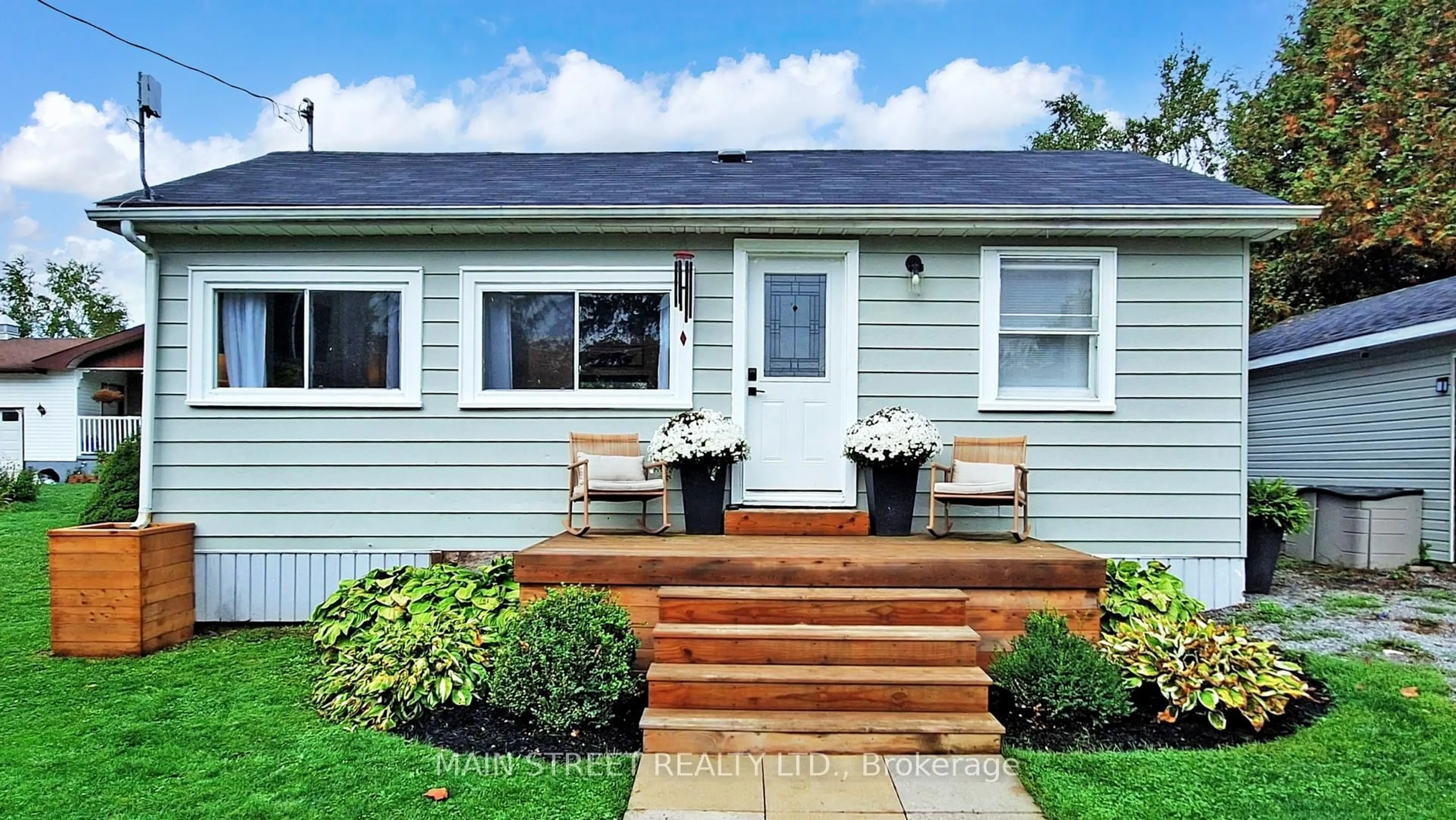 Home with vinyl exterior material, street for 32 Rhodes Ave, Kawartha Lakes Ontario L0C 1G0