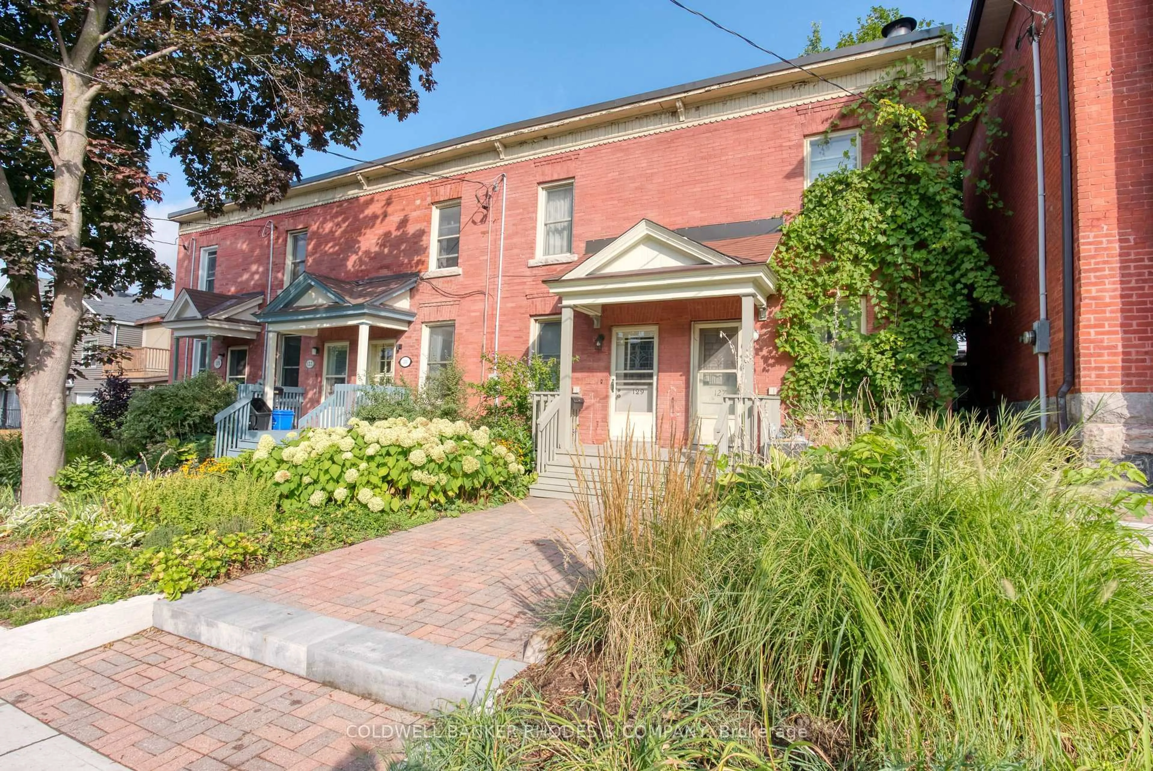 Home with brick exterior material, street for 129 Elm St, Ottawa Ontario K1R 6N4